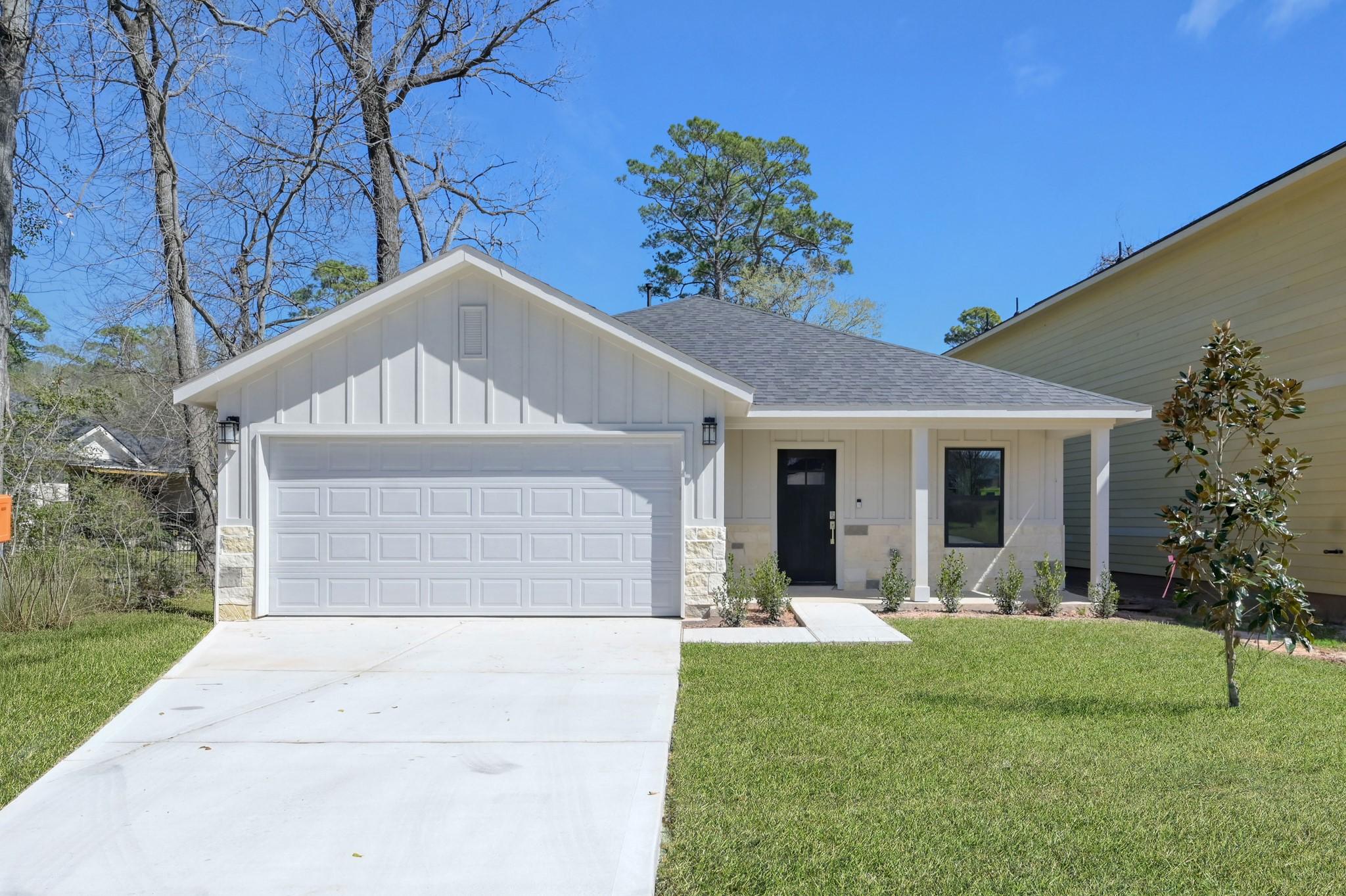 Image 2: Welcome home! This charming ranch-style residence