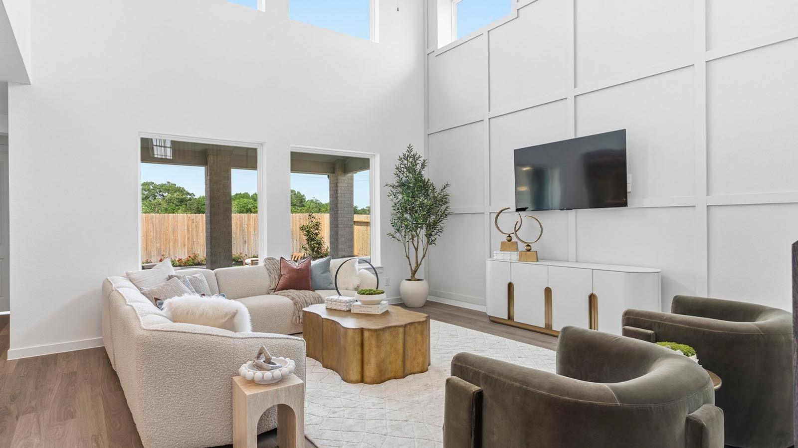 Image 4: A well-organized living room that includes a kitch