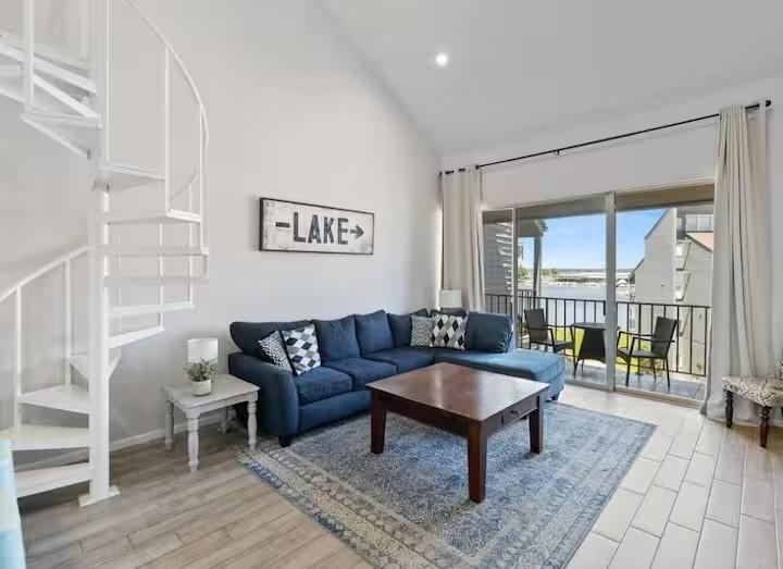 Image 2: Stylishly furnished living room is open and spacio