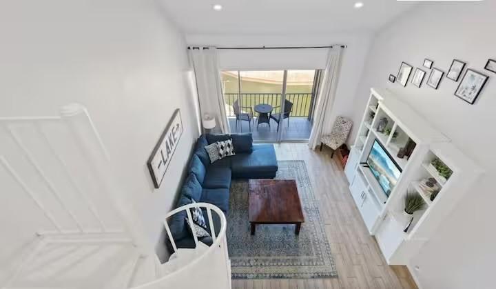 Image 4: View of the living room from the loft