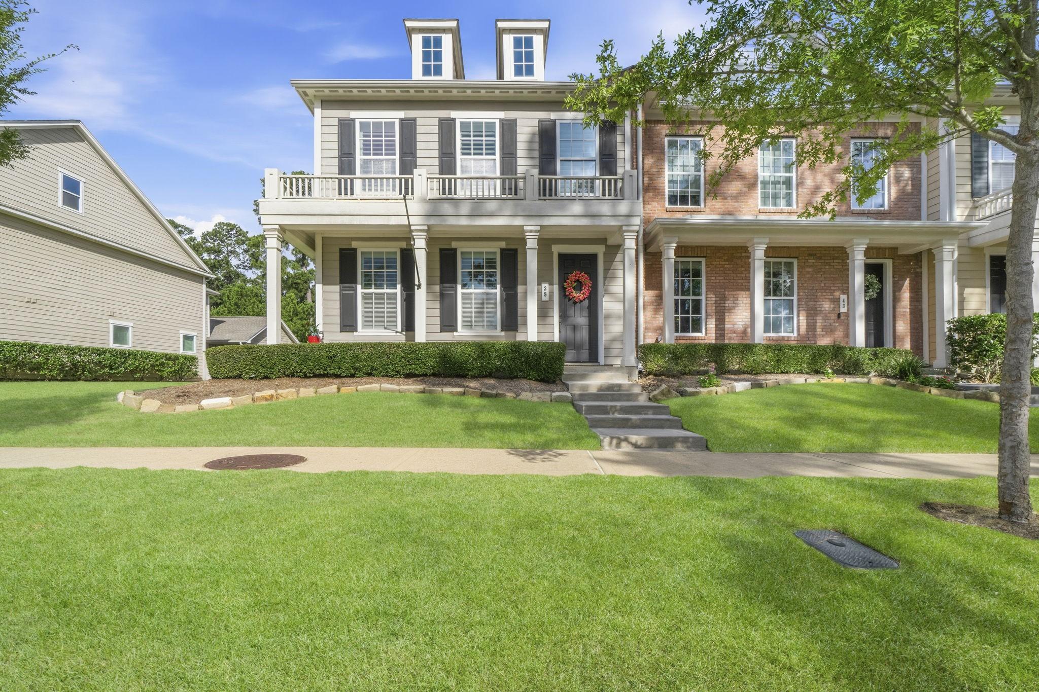 Image 1: This charming Liberty Branch townhome features a c