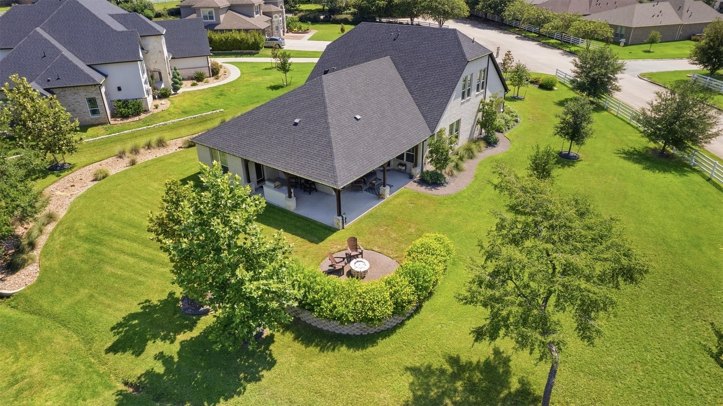 Image 4: From the back of the house. Notice the private sit