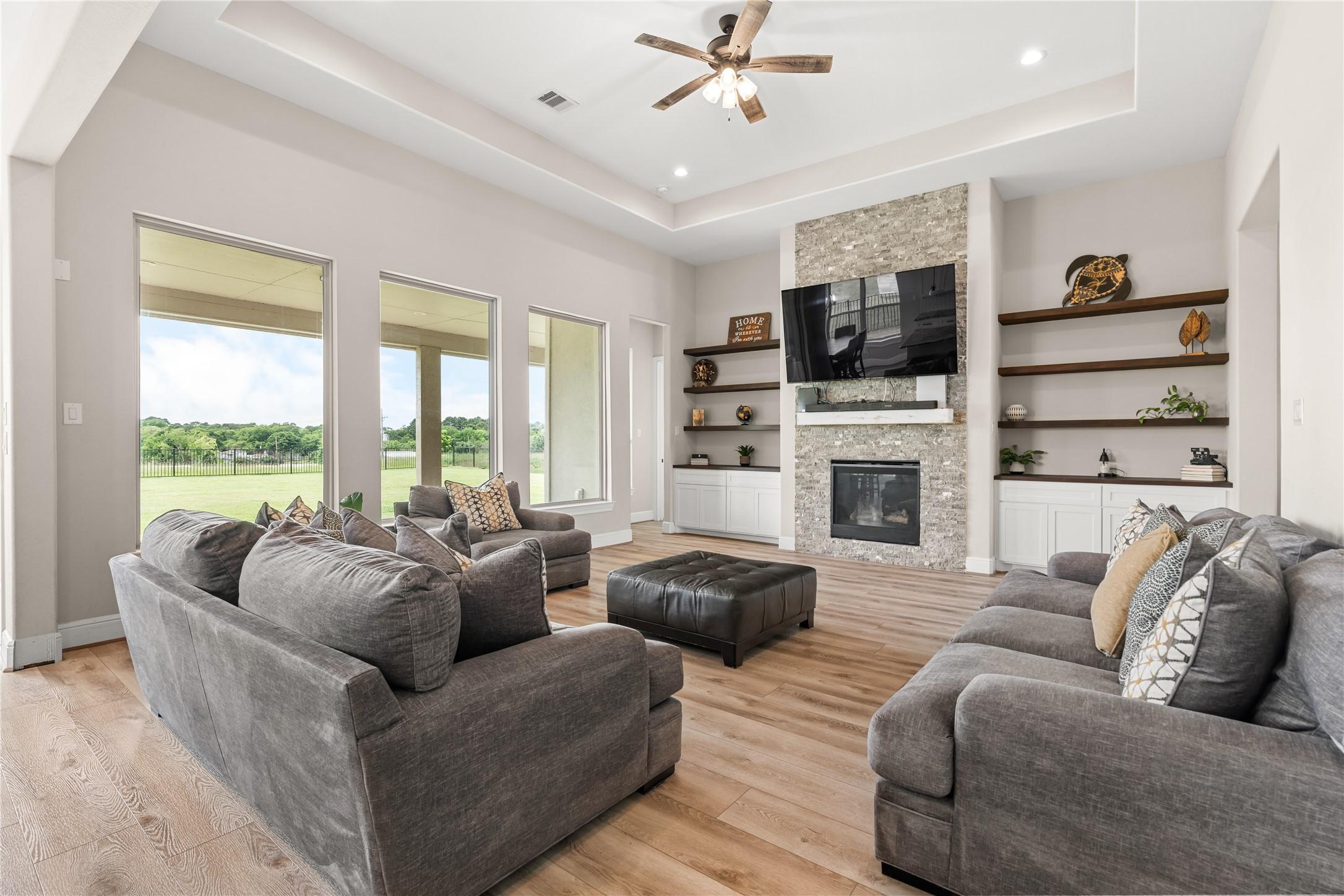 Image 1: Tucked within a gated community just moments from