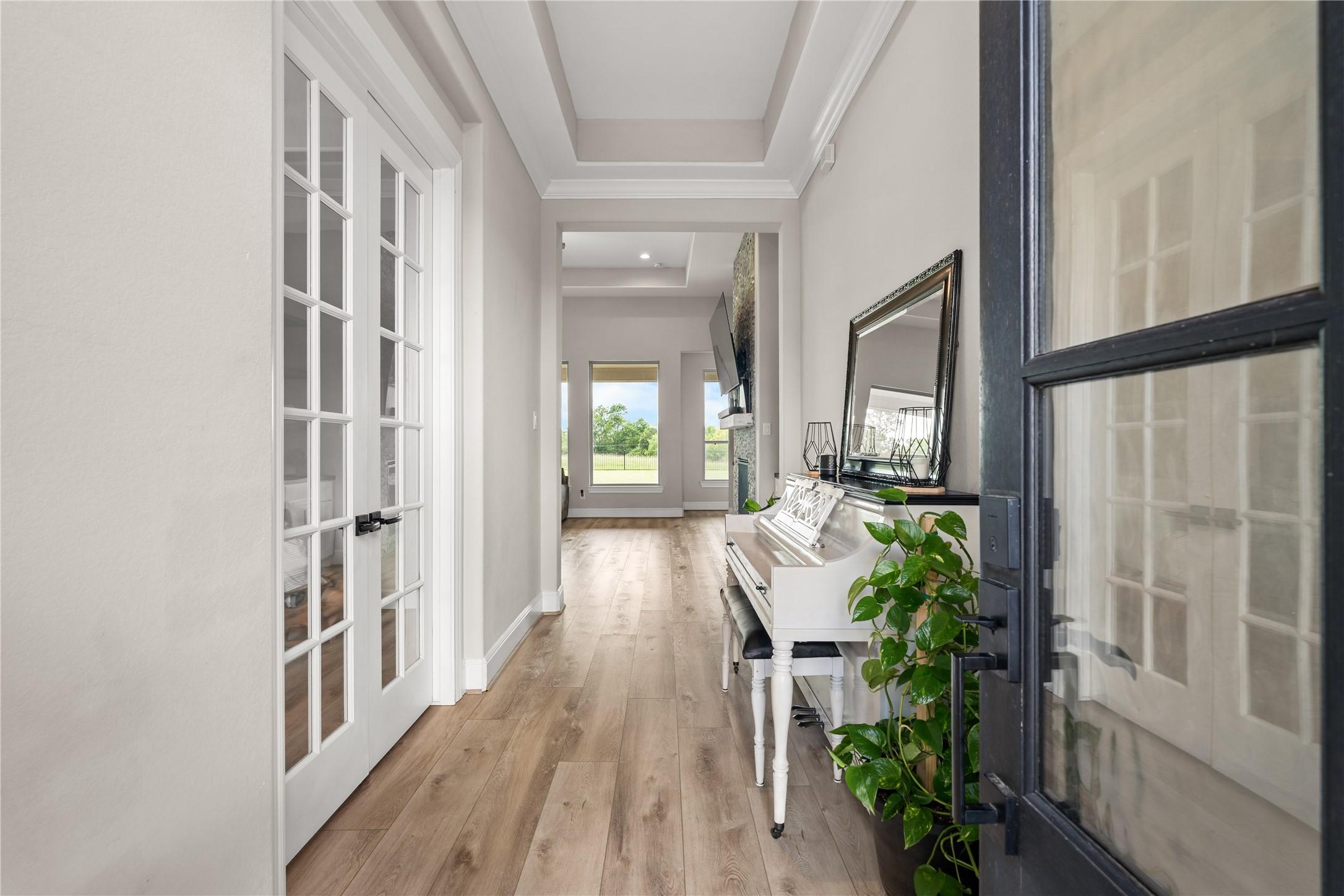 Image 4: Thoughtful details begin at the front door, where