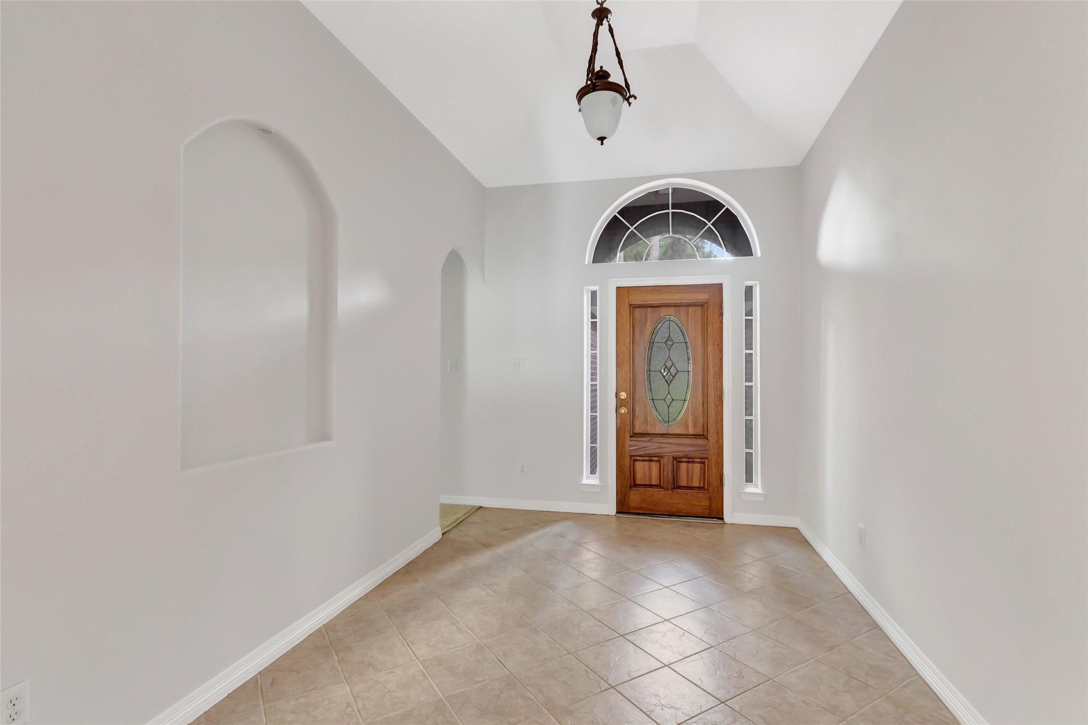 Image 4: Welcome home! As you enter the Foyer, to the right