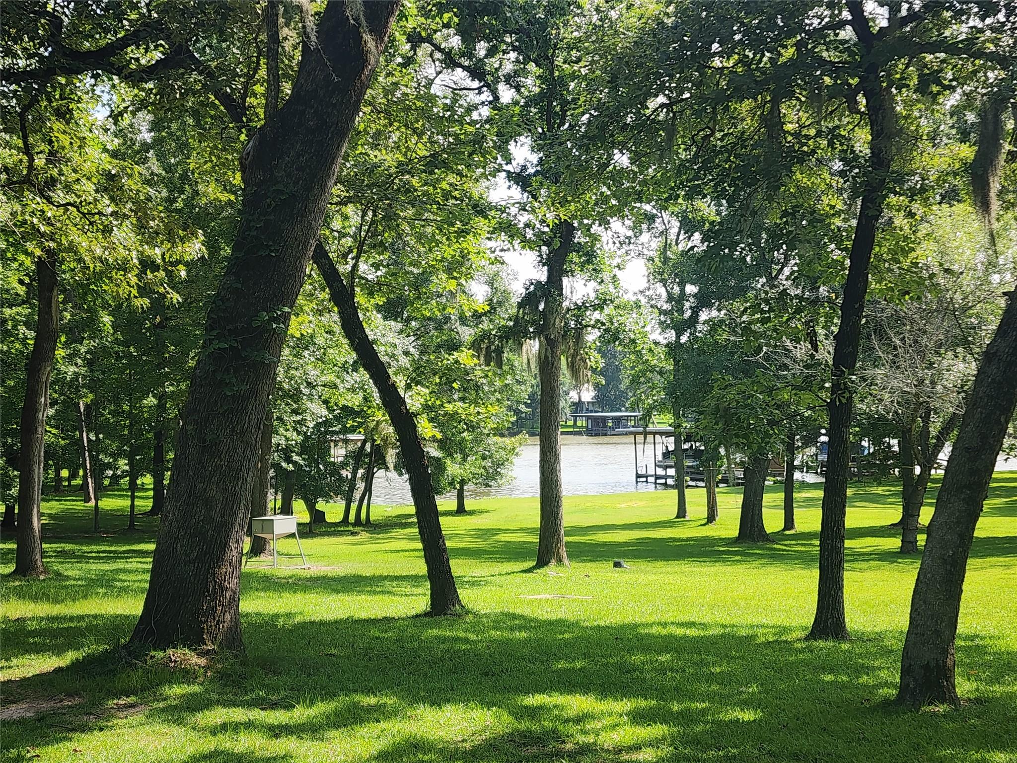 Image 2: Enjoy the waterfront view across Red Oak Ln.