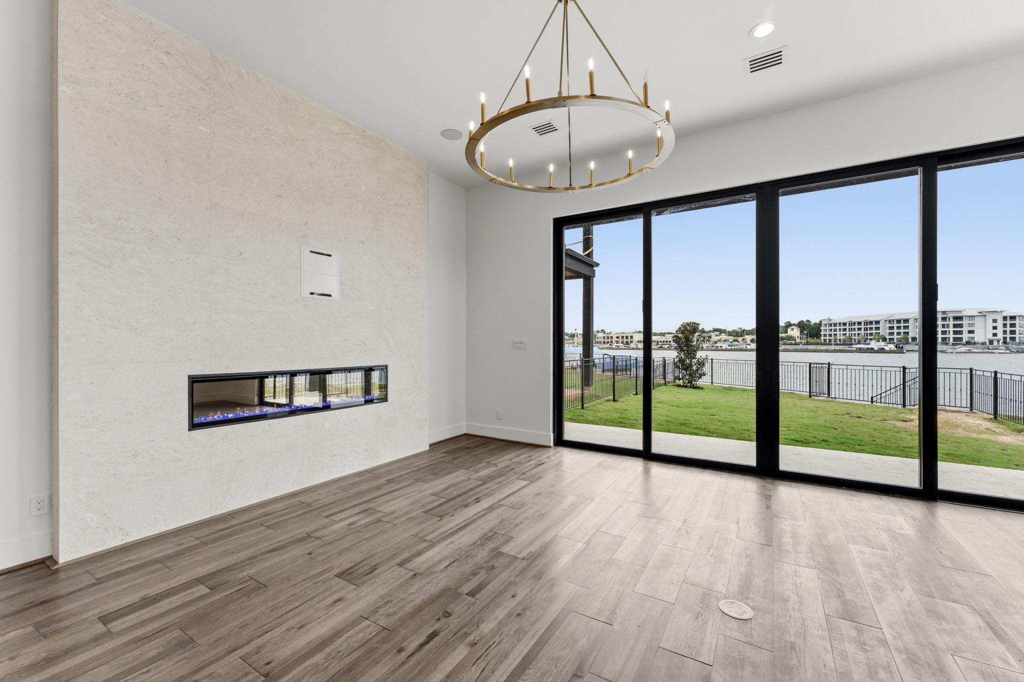 Image 4: Living area with views of lake Conroe. Finished ho