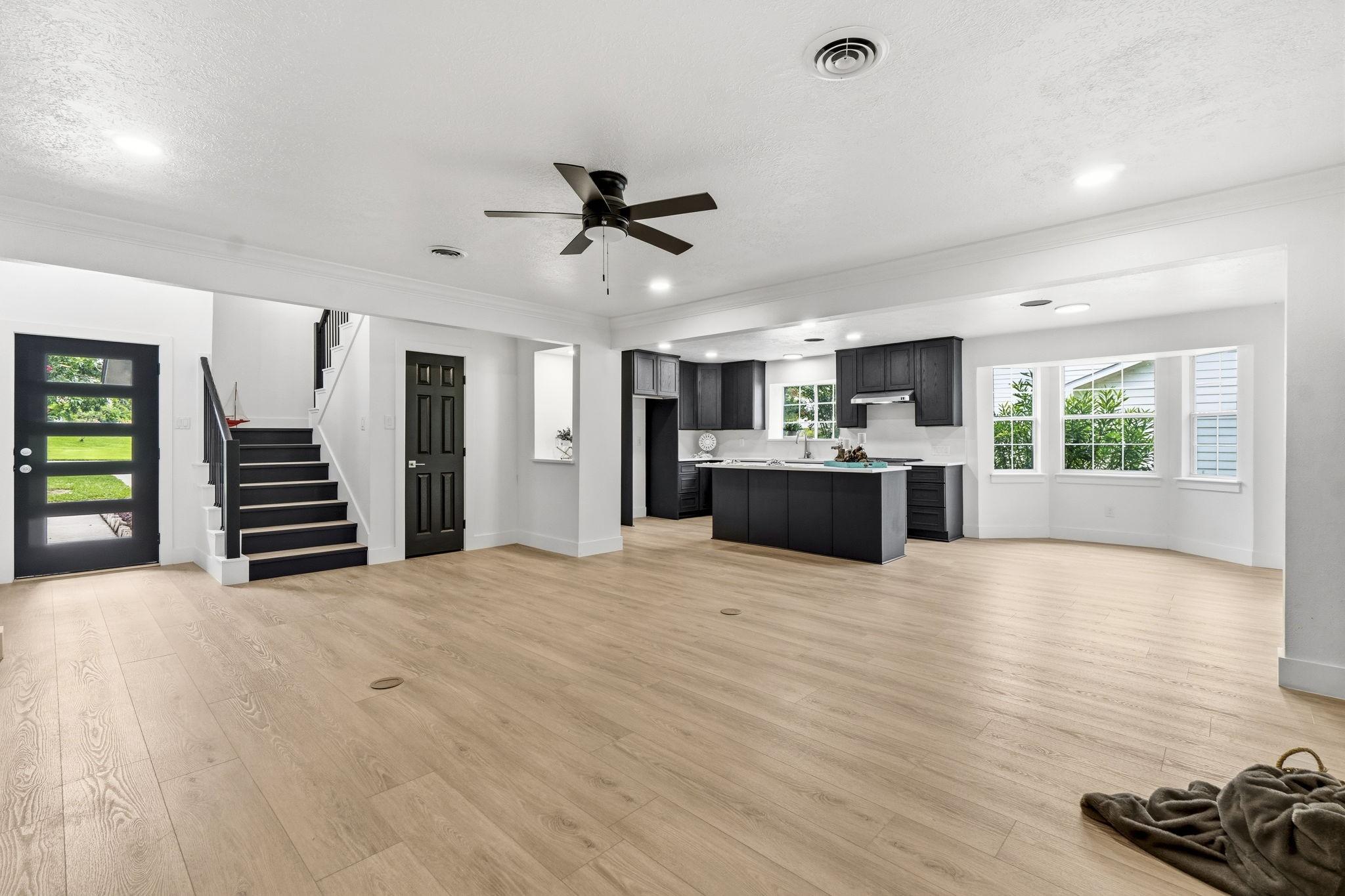 Image 4: The foyer features a 2 story ceiling
