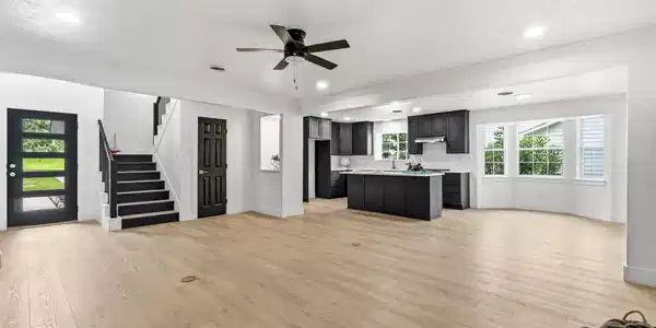 Image 4: The foyer features a 2 story ceiling
