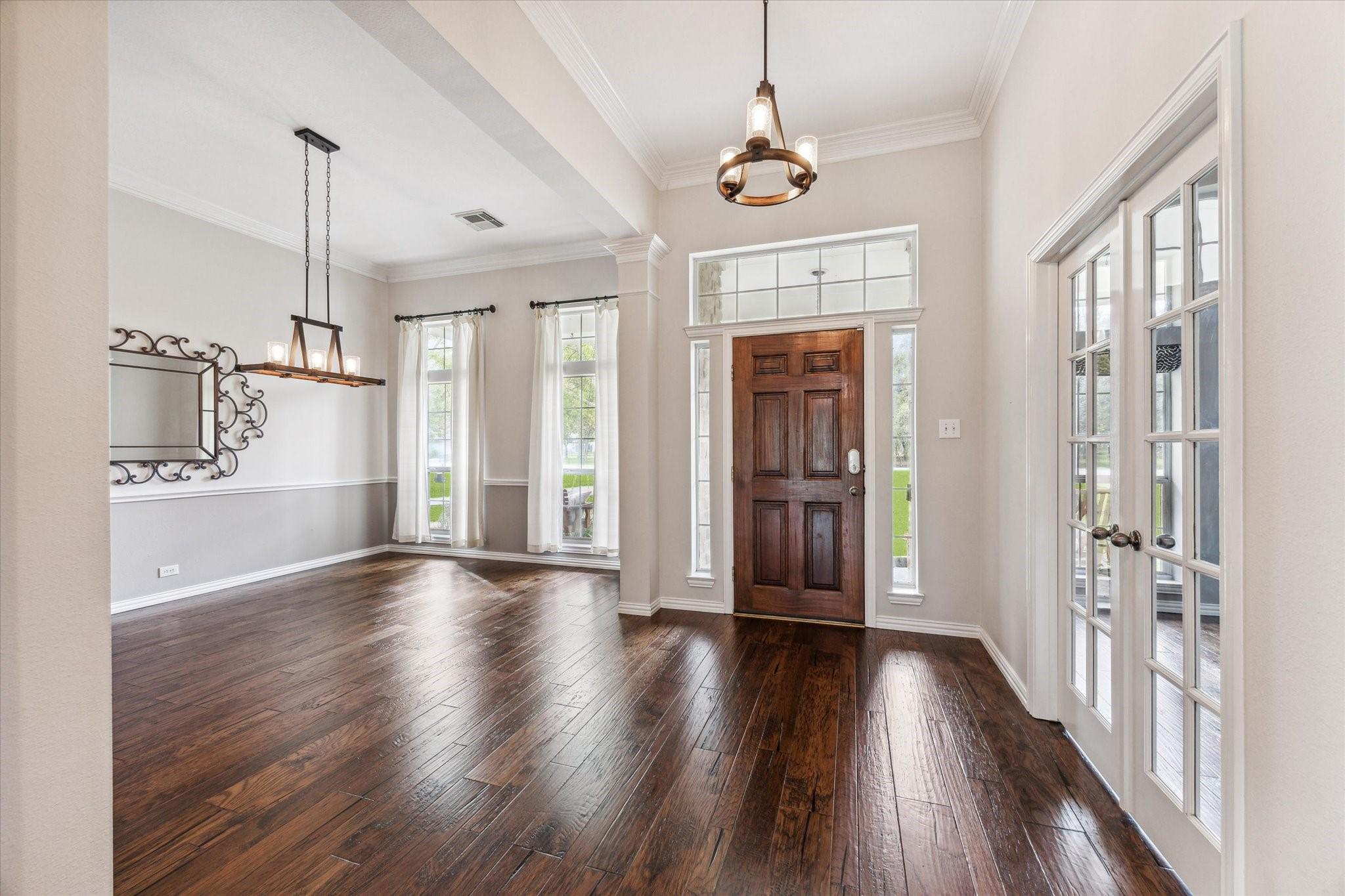 Image 4: The front entrance to the home is impressive from