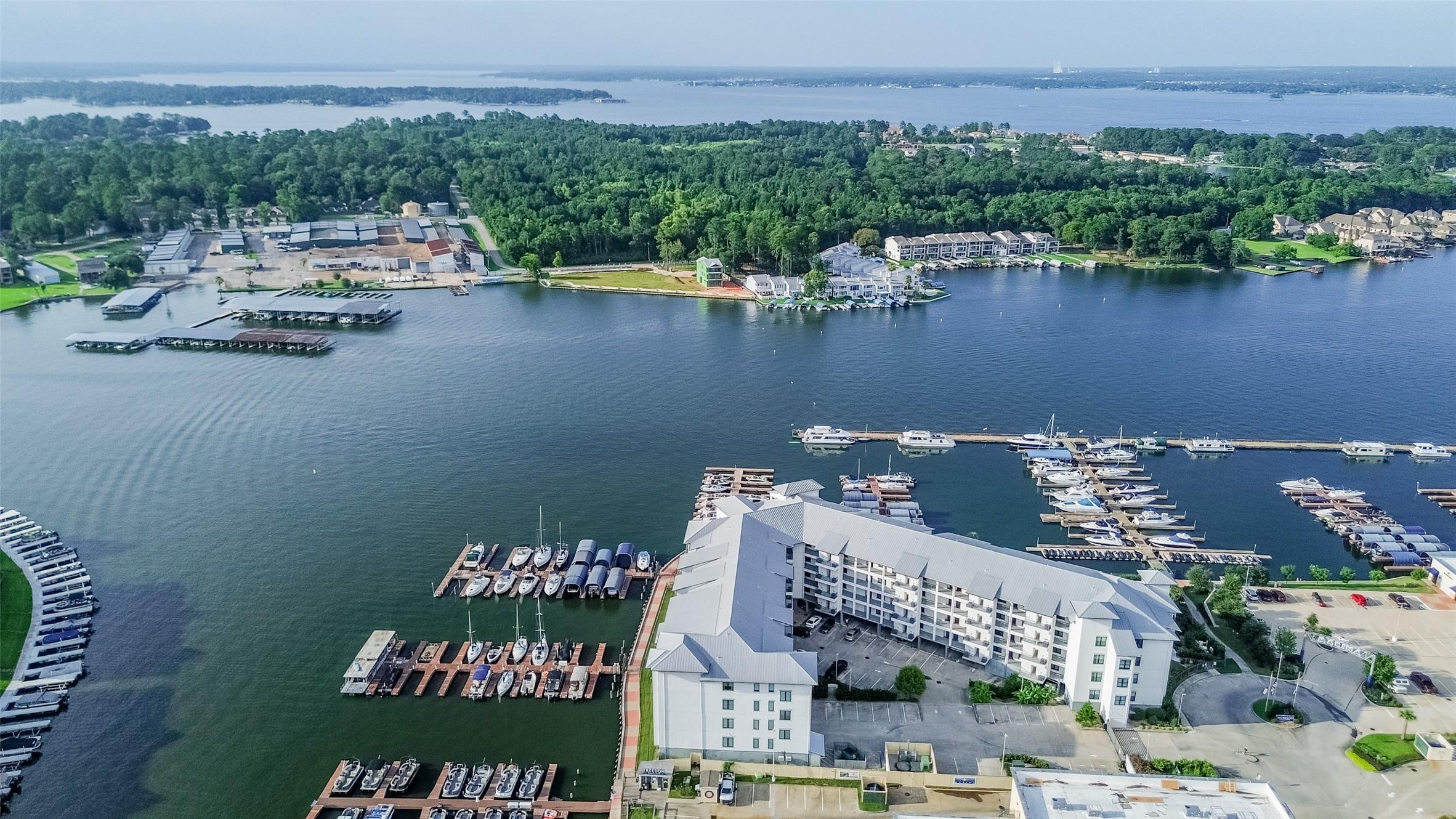 Image 1: Lake Conroe is approximately 21,000 acres and 21 m