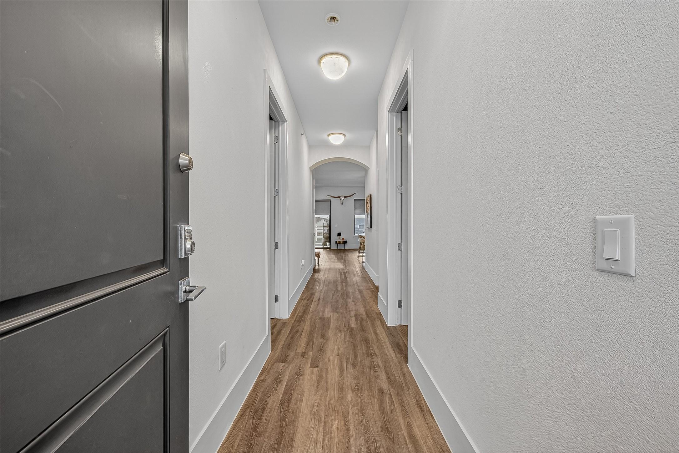 Image 3: Upon entering the condo, you have the primary suit