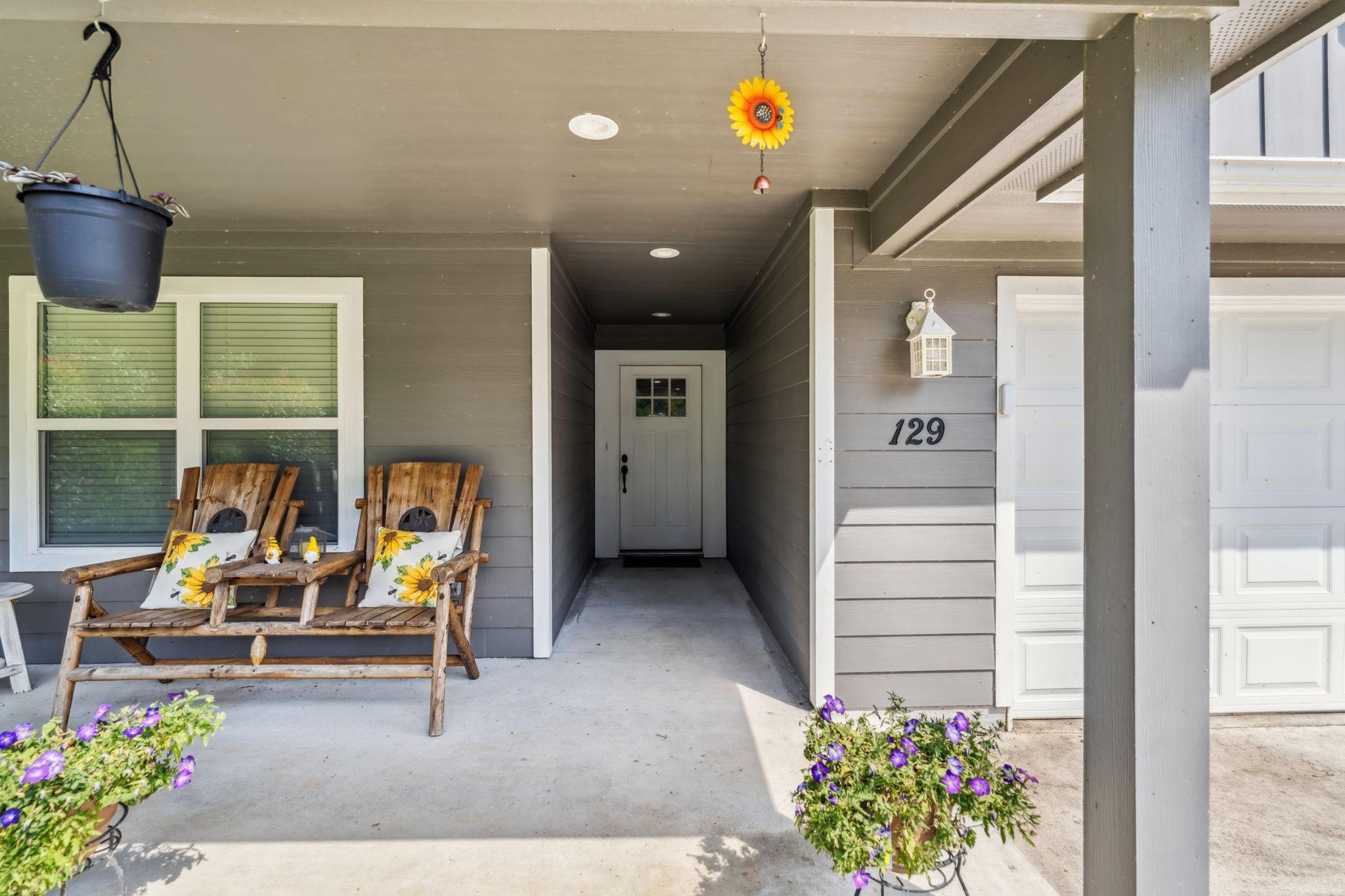 Image 2: Deep front porch welcomes you home