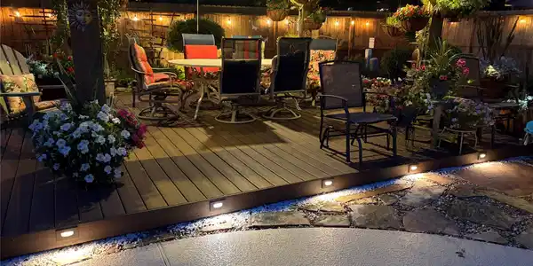 Image 2: outdoor deck with pergola in the background