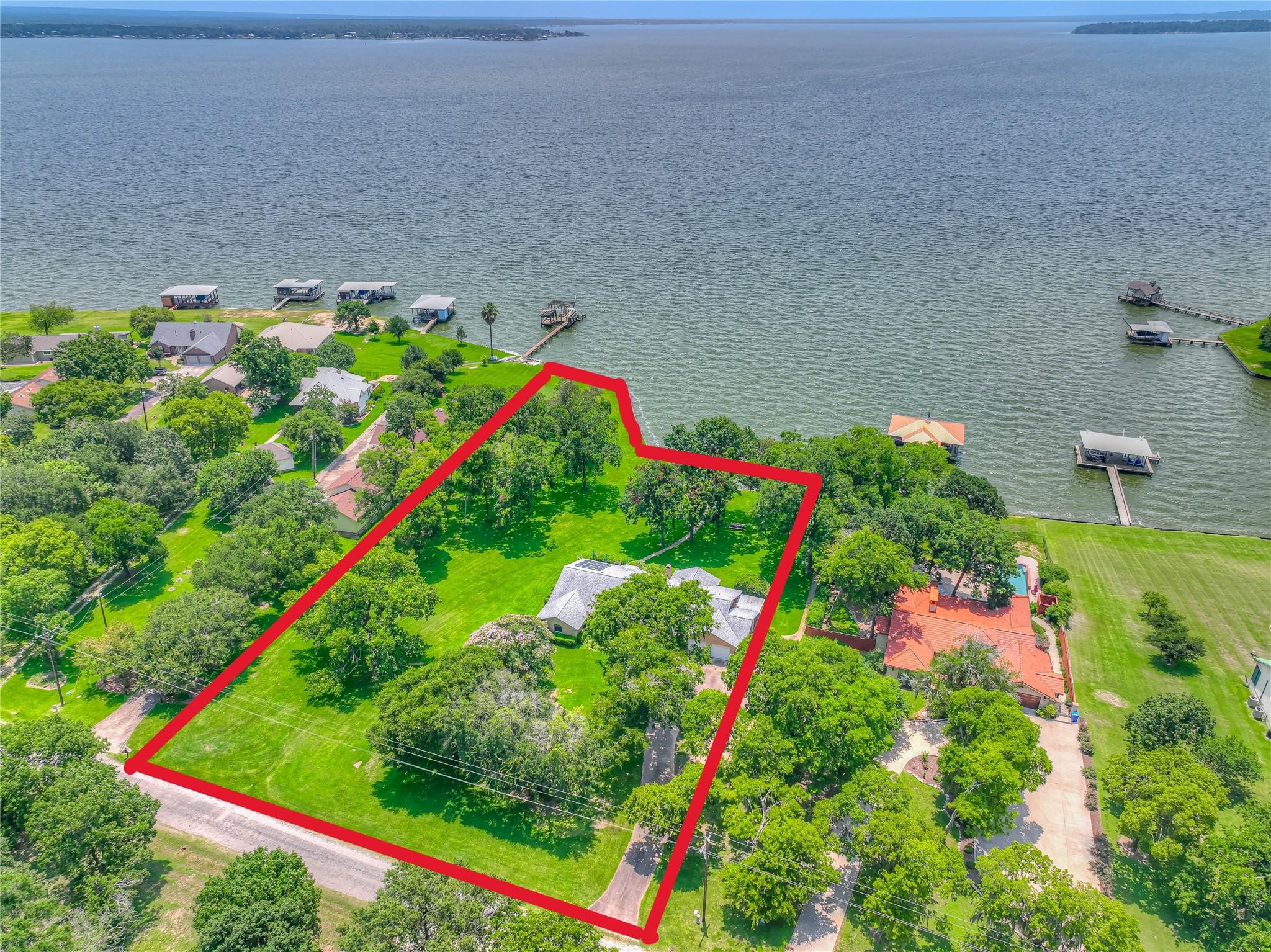 Image 2: Red line indicates estimated property lines.