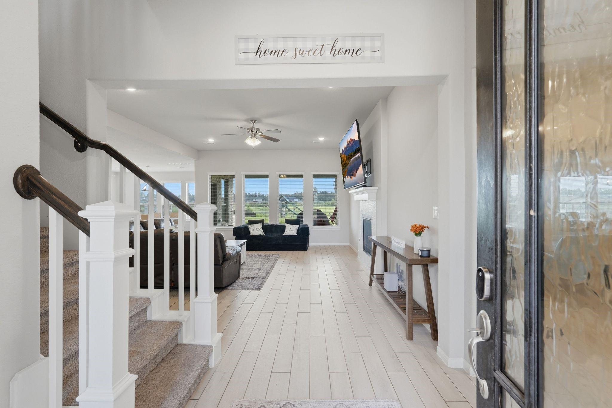Image 4: Entry way with beautiful wood look tile flooring