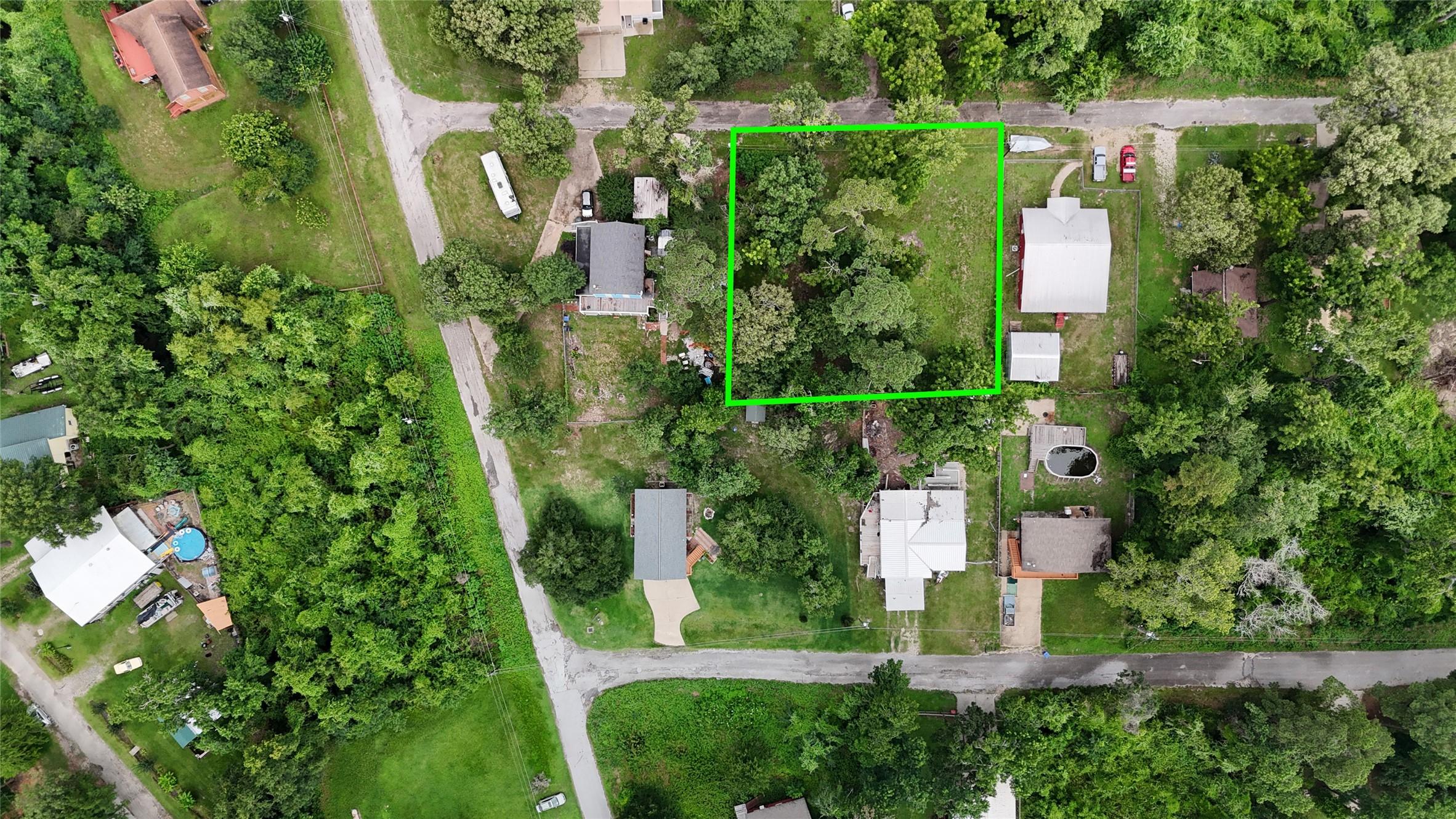Image 3: Closer aerial view of your lots and the surroundin