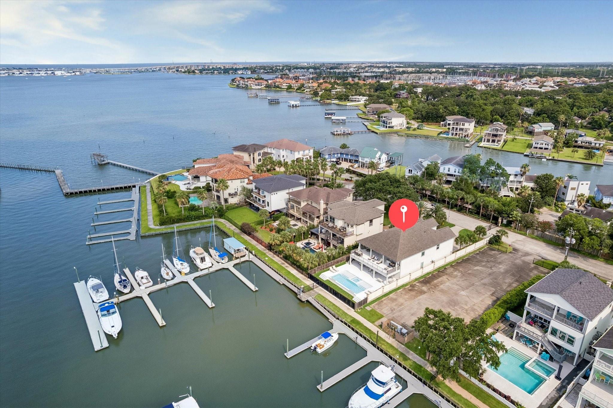 Image 3: Situated in an exclusive waterfront community. Thi