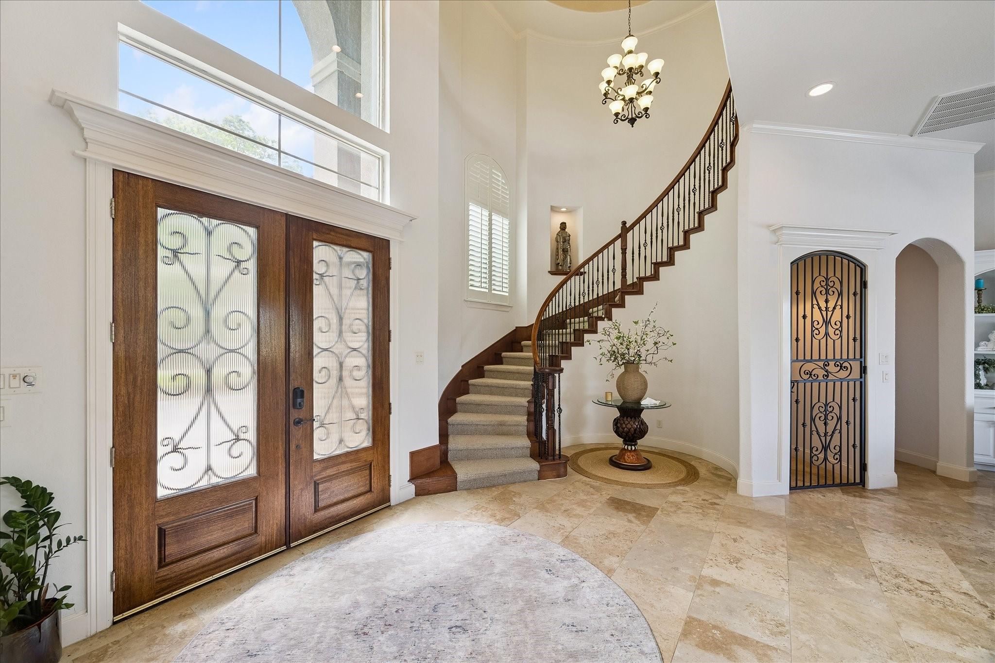 Image 4: Glass-front doors, soaring ceilings and large wind