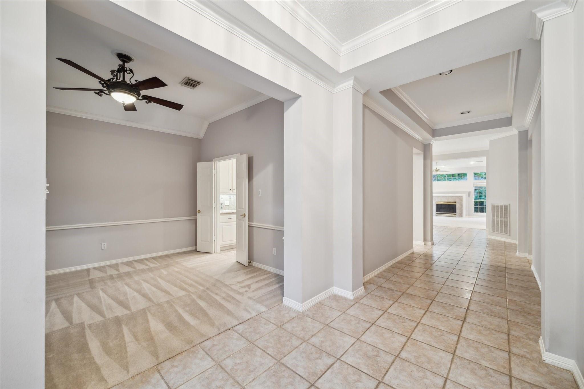 Image 3: Tiled entry with high ceilings. Dining to the left