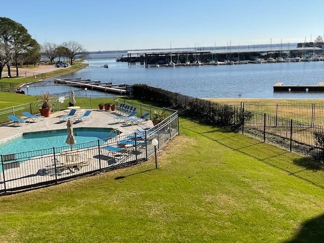 Image 3: The Point&rsquo;s private pool and boat docks looking do