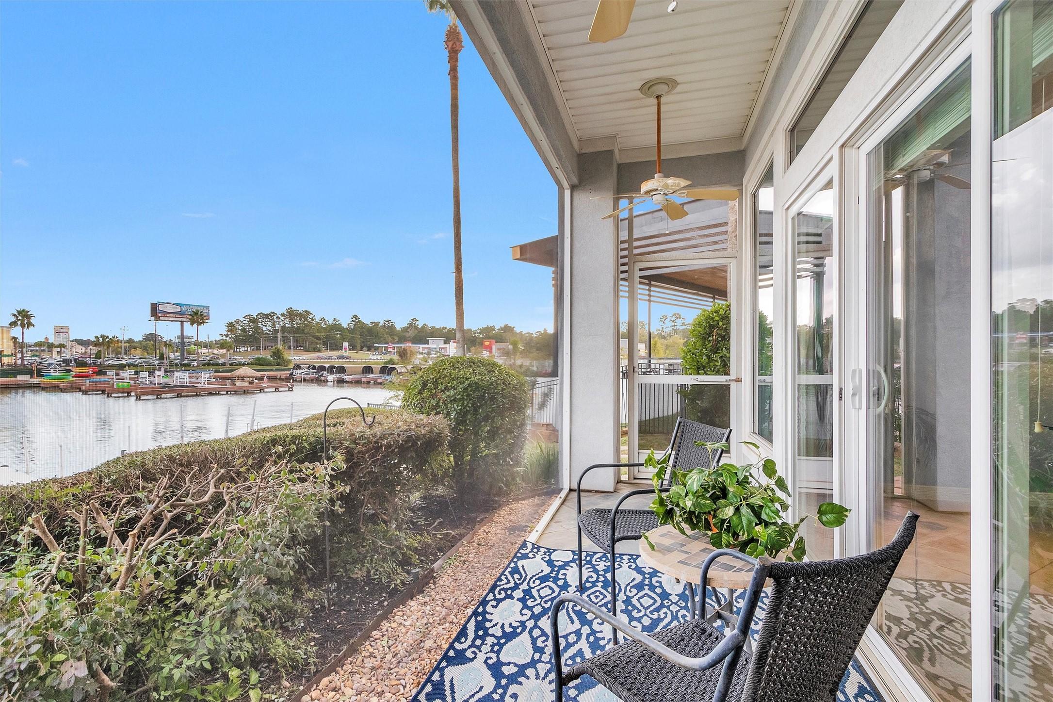 Image 2: This photo showcases a serene waterfront patio wit