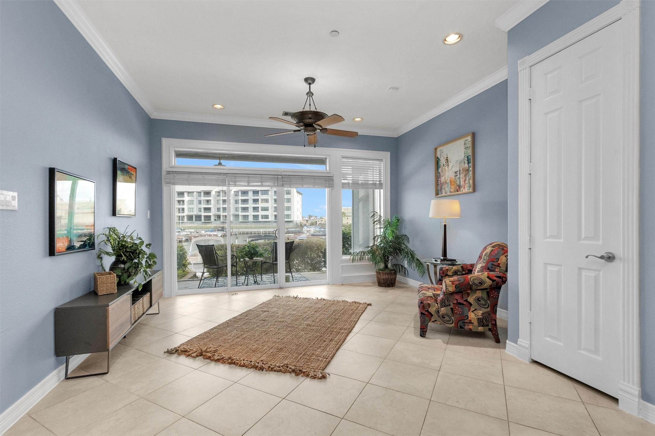 Image 4: Bright and inviting room with light blue walls, la