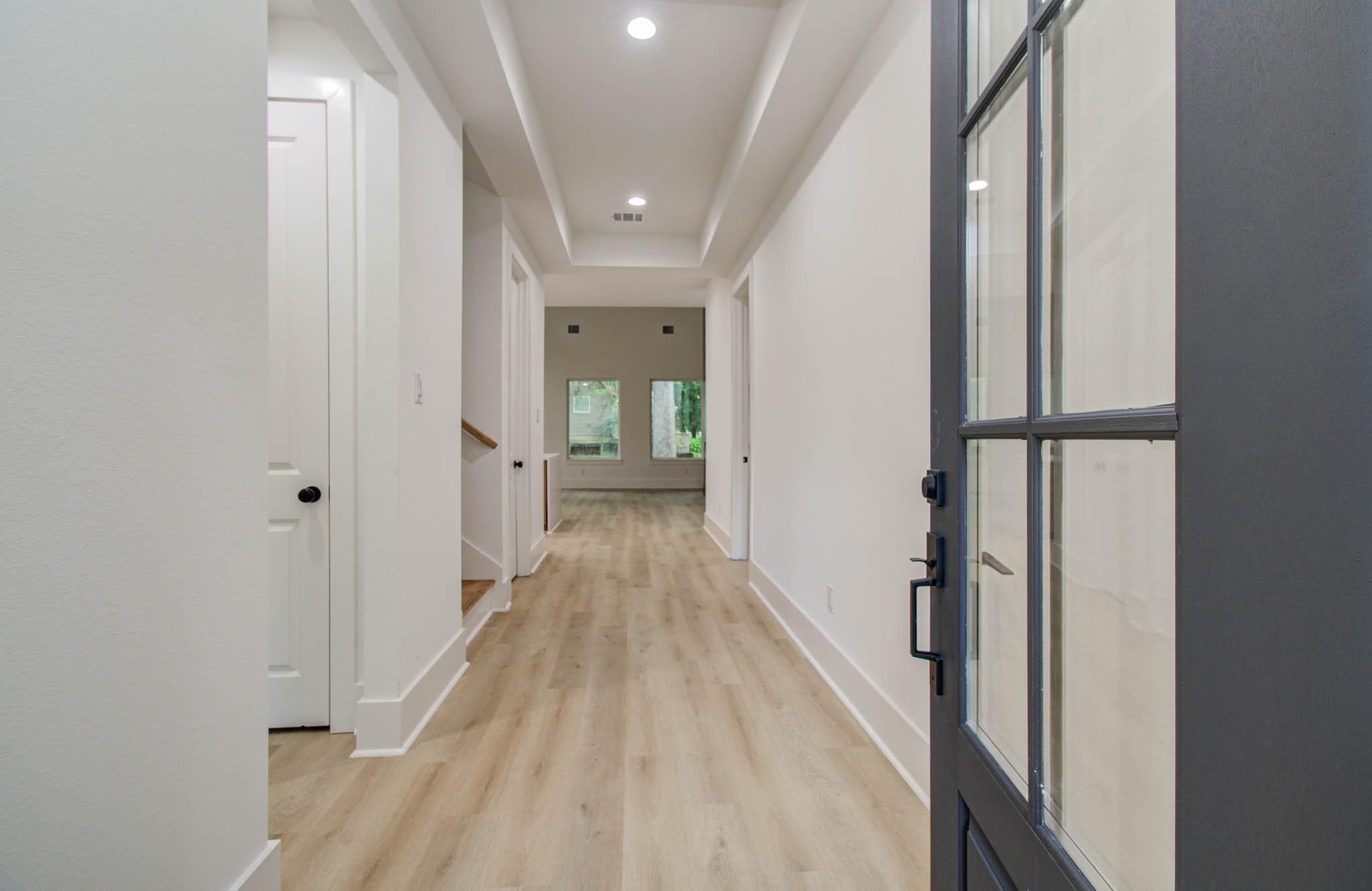 Image 2: Modern two-story entryway
