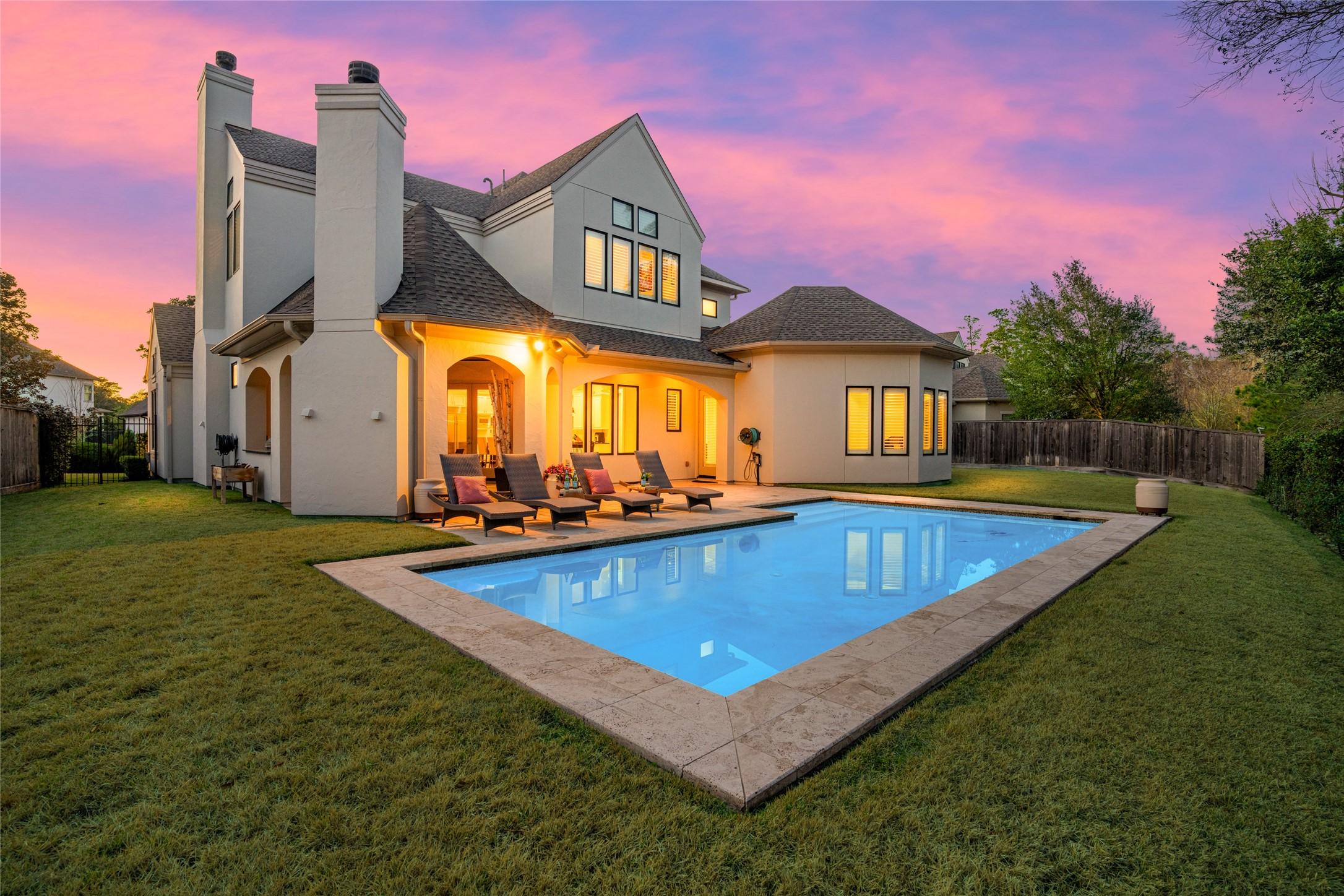 Image 4: 16x32 heated and chilled saltwater pool in a moder