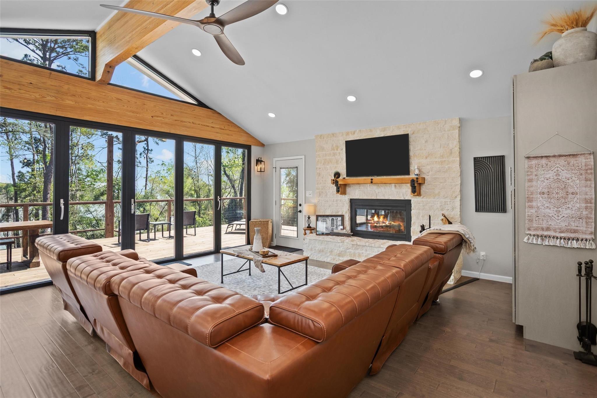 Image 4: A wall of windows that fold and open to patio and