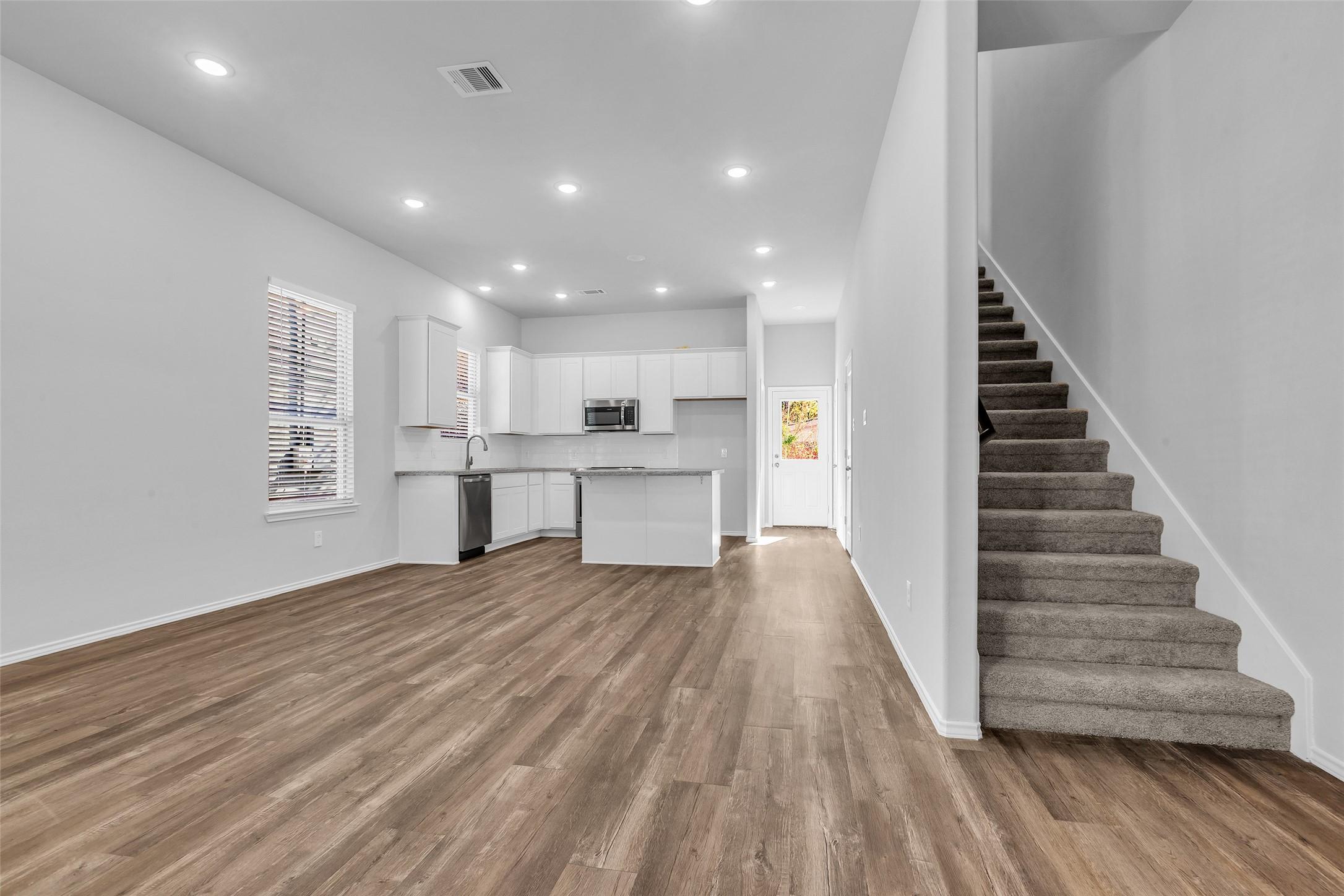 Image 3: LVP flooring and High Ceilings