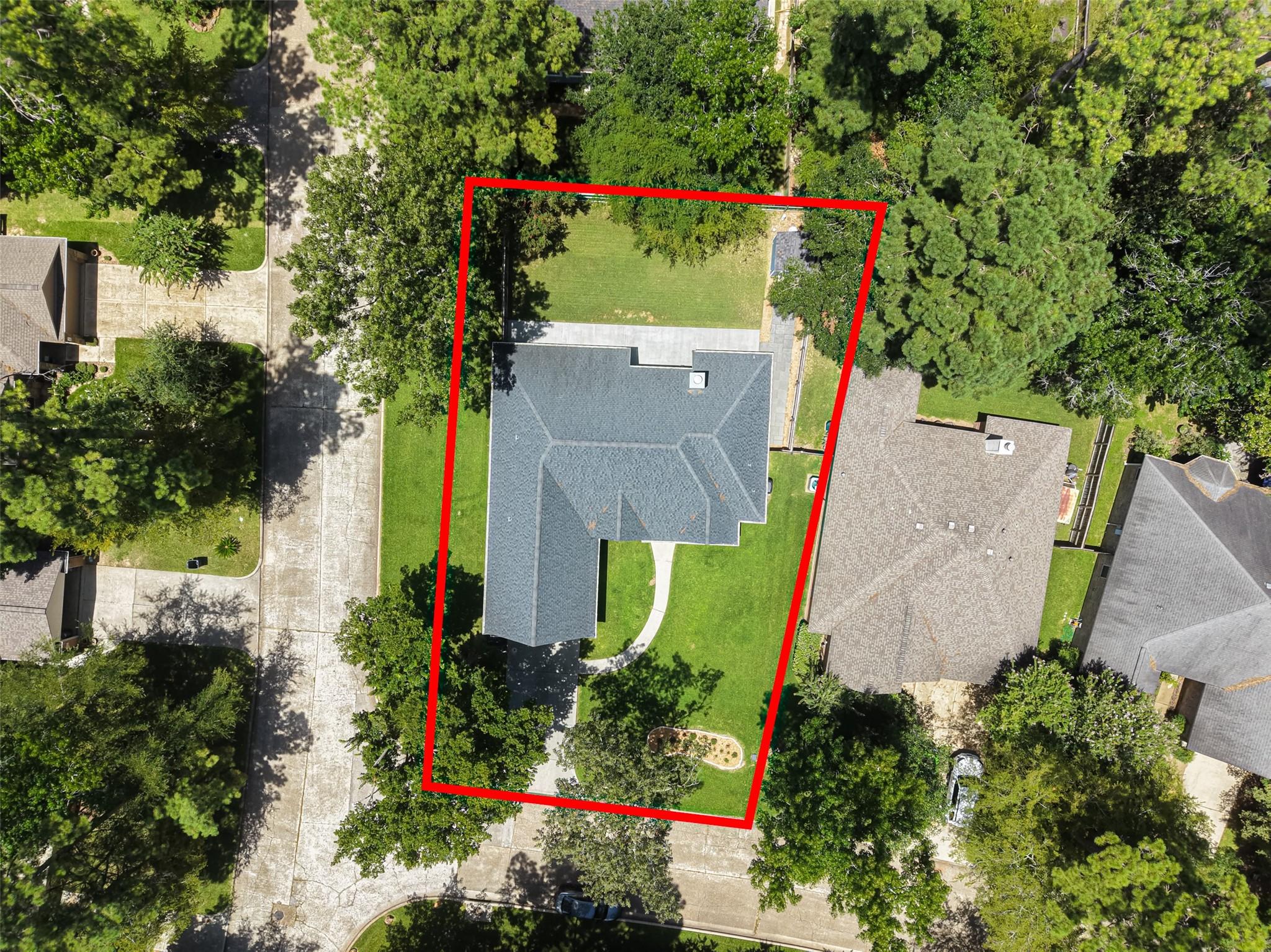 Image 2: Aerial View showing the spacious property on a cor