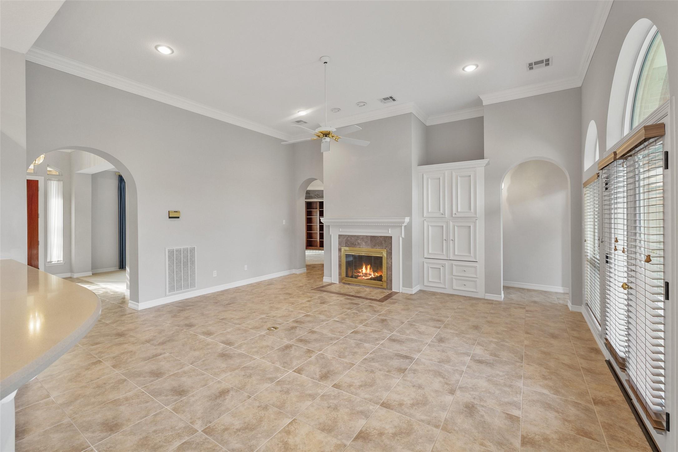 Image 4: Main living area is spacious! High ceilings, crown