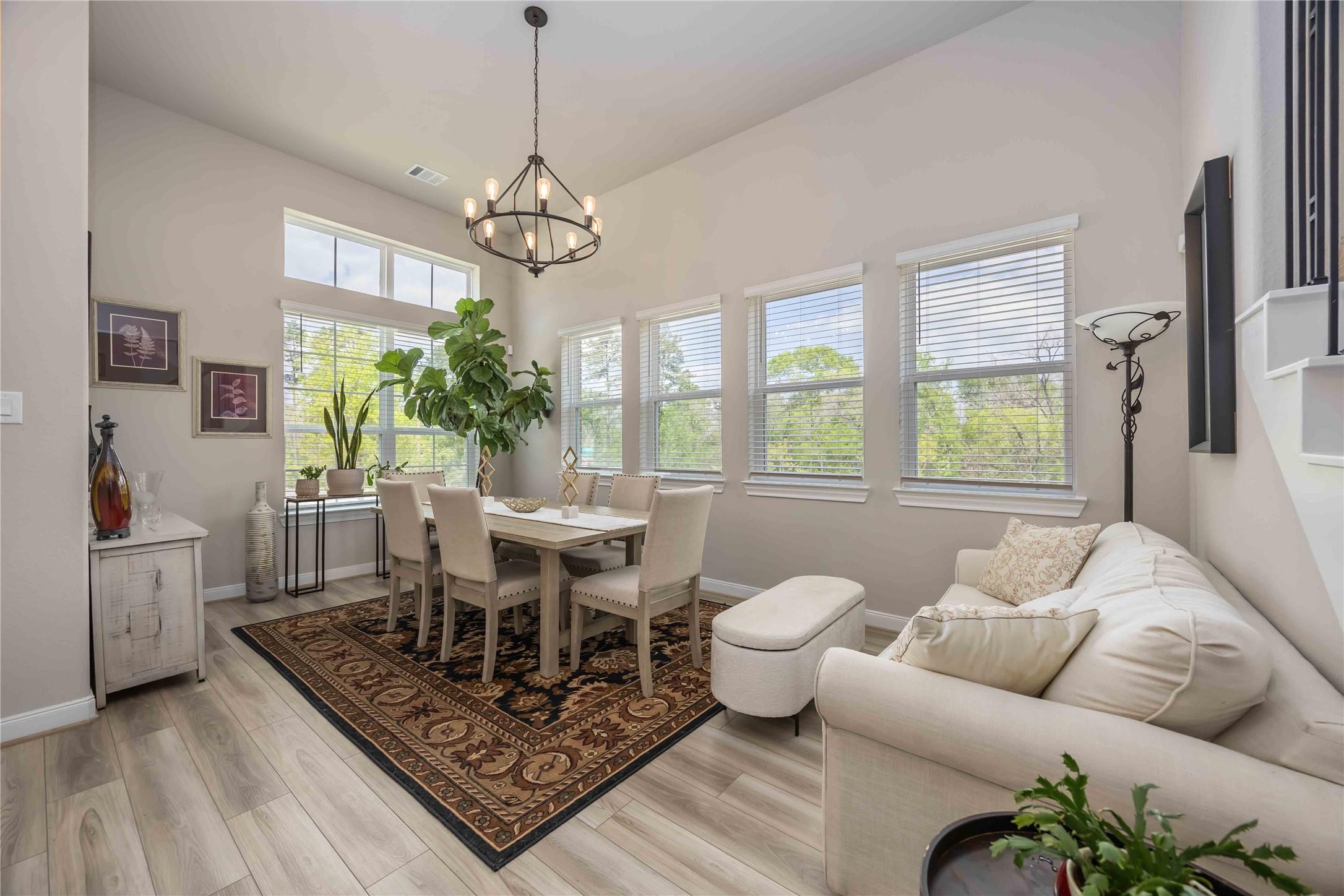 Image 4: The formal dining space exudes an inviting atmosph