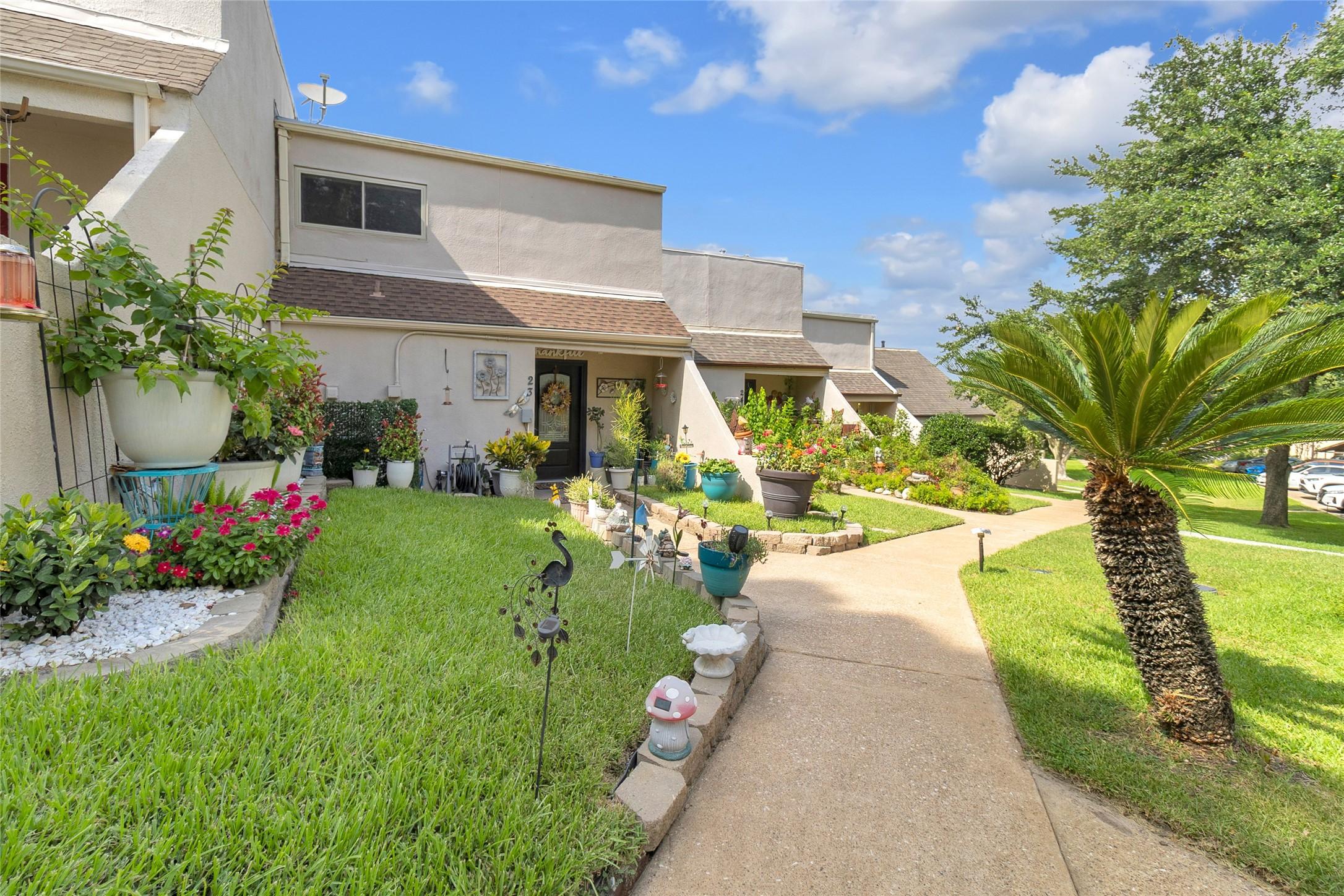 Image 3: April Hill sidewalk to welcoming front porch