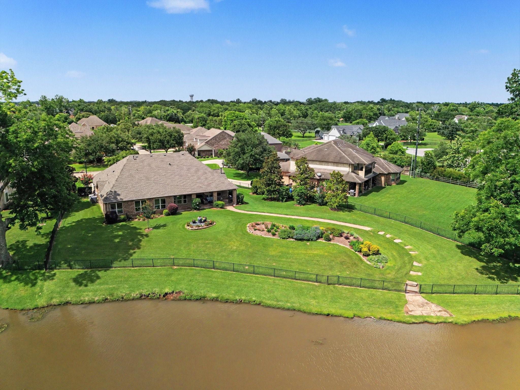 Image 4: This photo showcases a serene suburban property fe