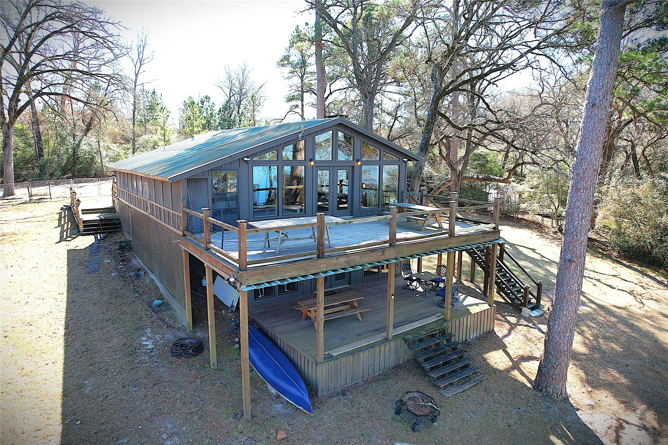 Image 2: Back of home facing Lake