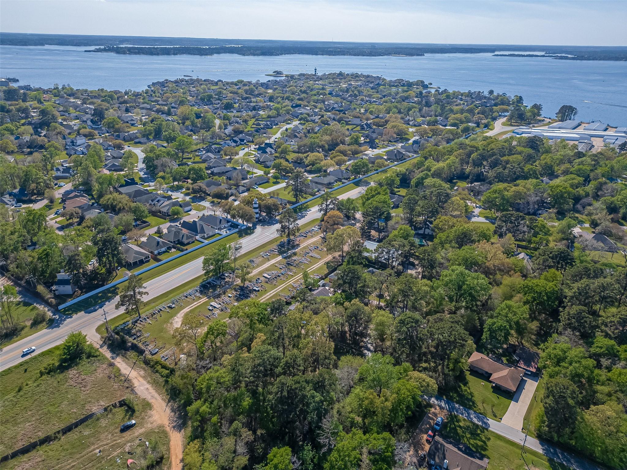 Image 1: Notice its proximity to Lake Conroe located in Lak