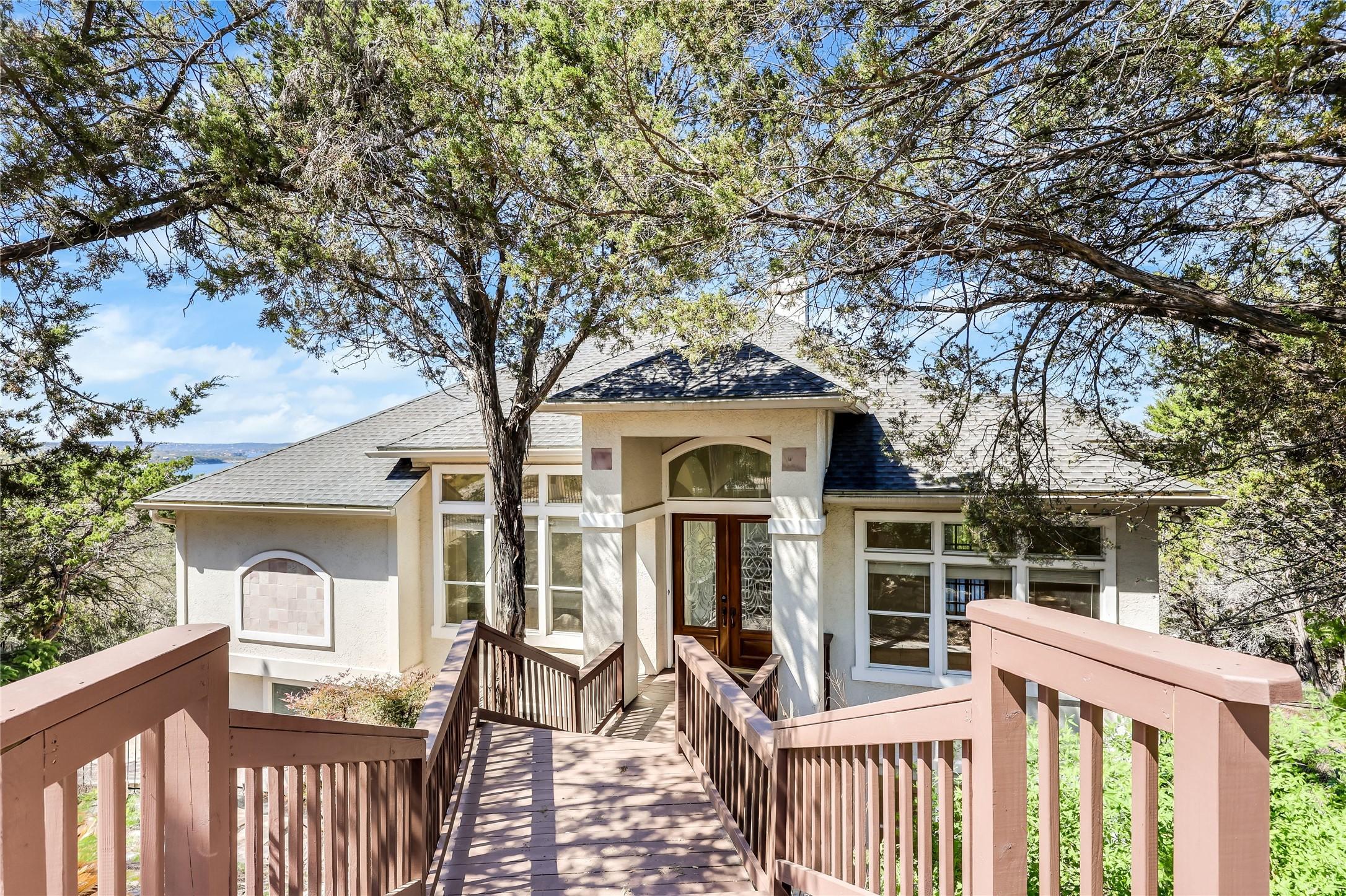 Image 1: Welcome to 7008 Deepwood Dr. Nestled in Lago Vista