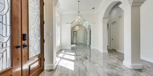 Image 2: The formal dining greets you as you walk in the fr