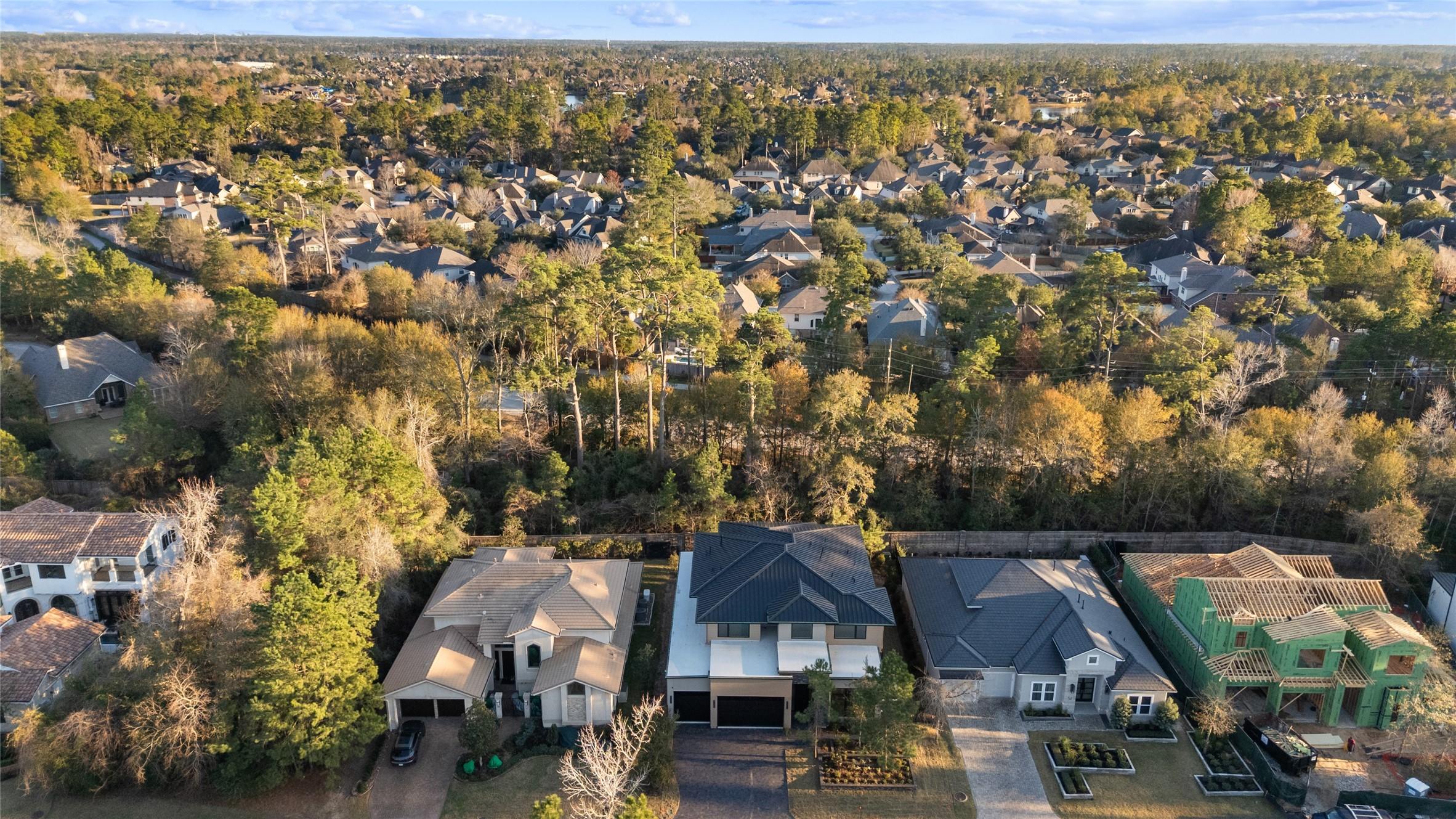 Image 4: This aerial photo showcases a suburban neighborhoo