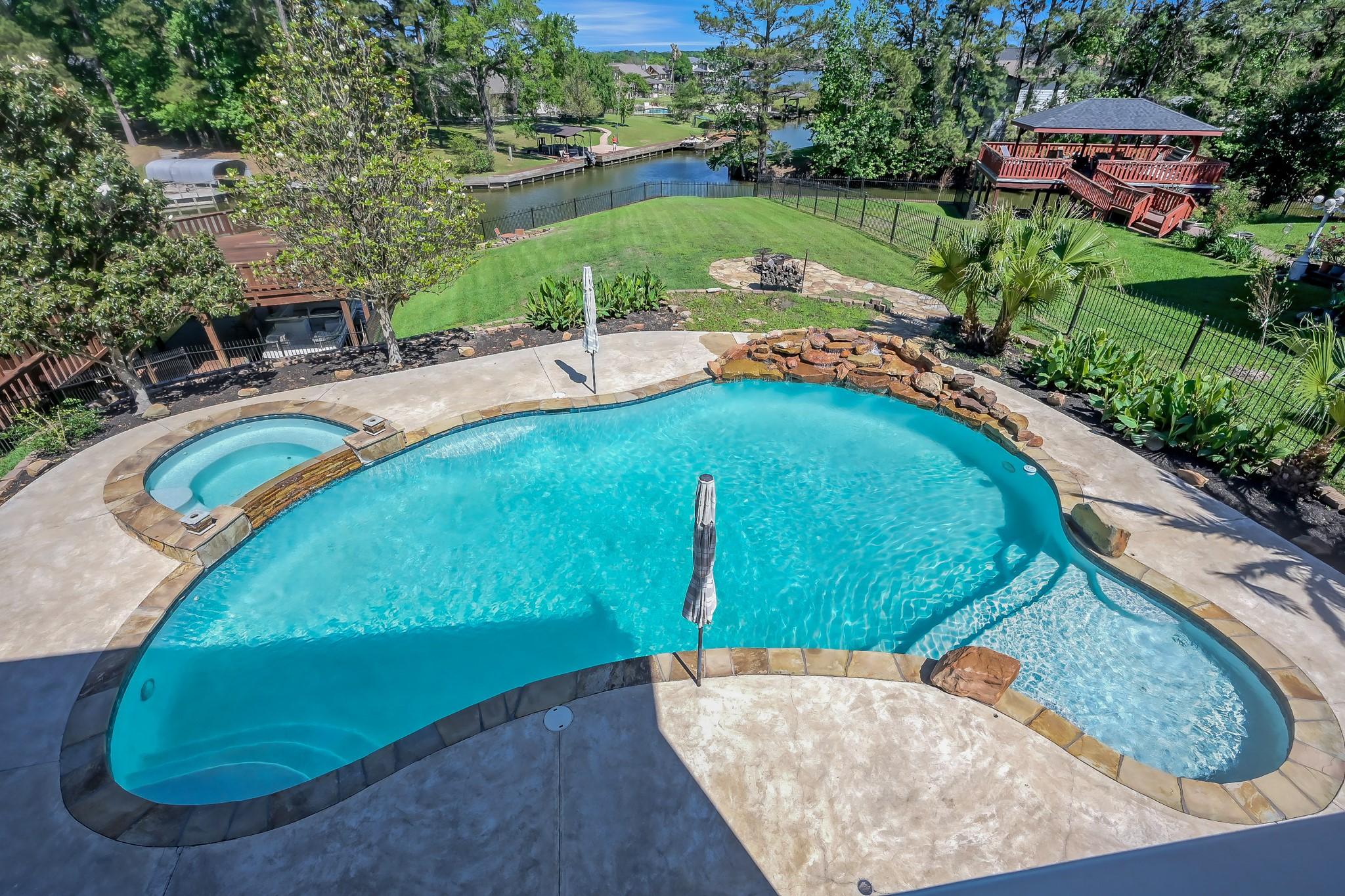 Image 4: View of Pool from Upstairs Balcony