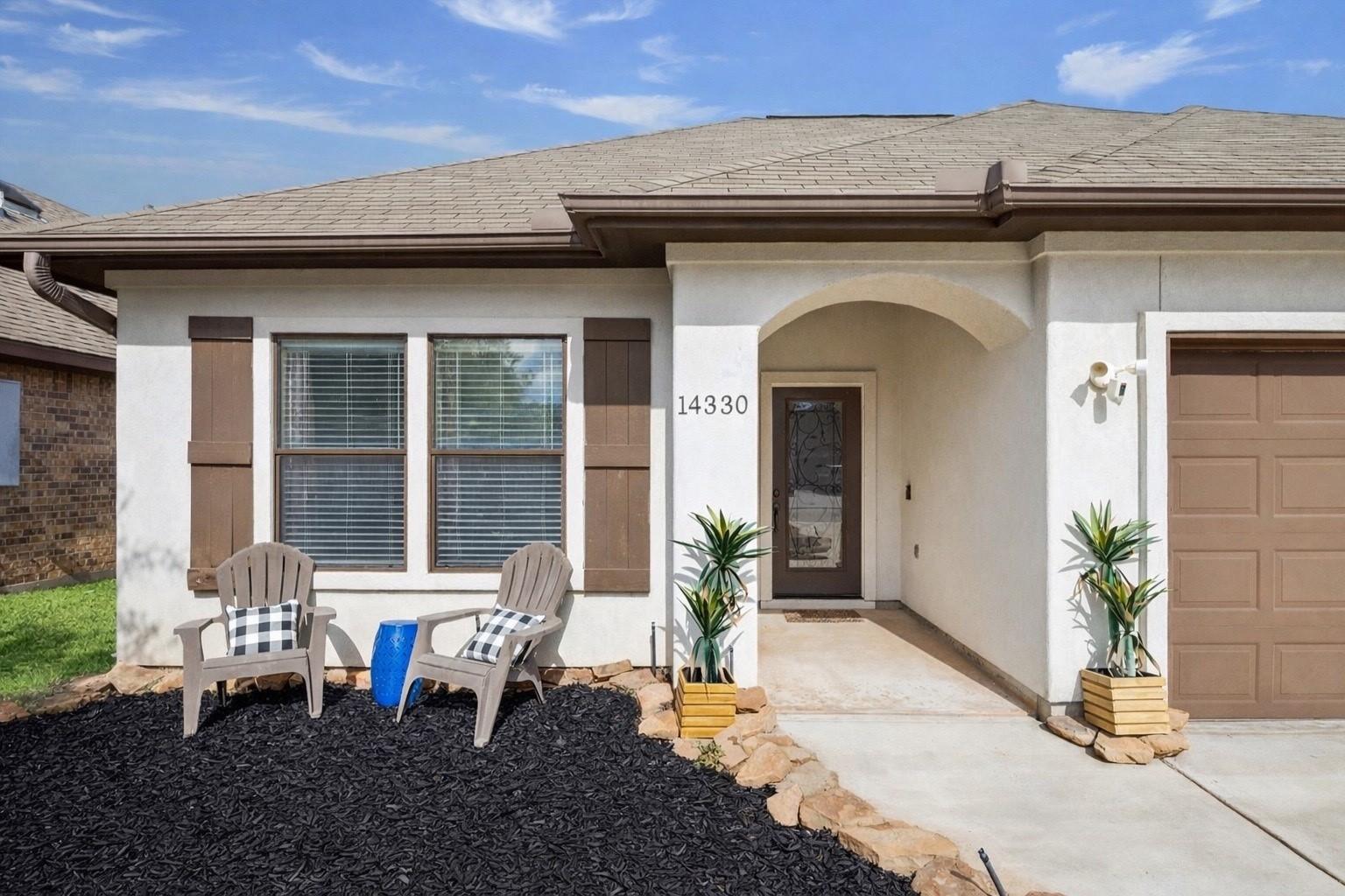 Image 2: Front entrance to 14330 S Summerchase Circle