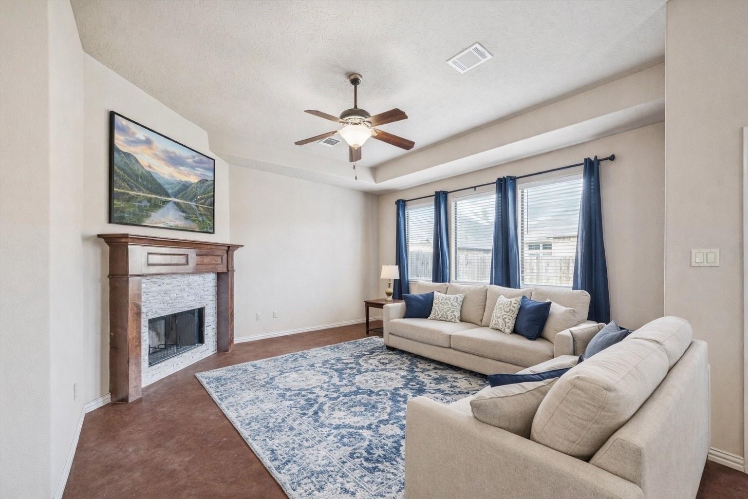 Image 4: Virtually staged living room to show potential lay