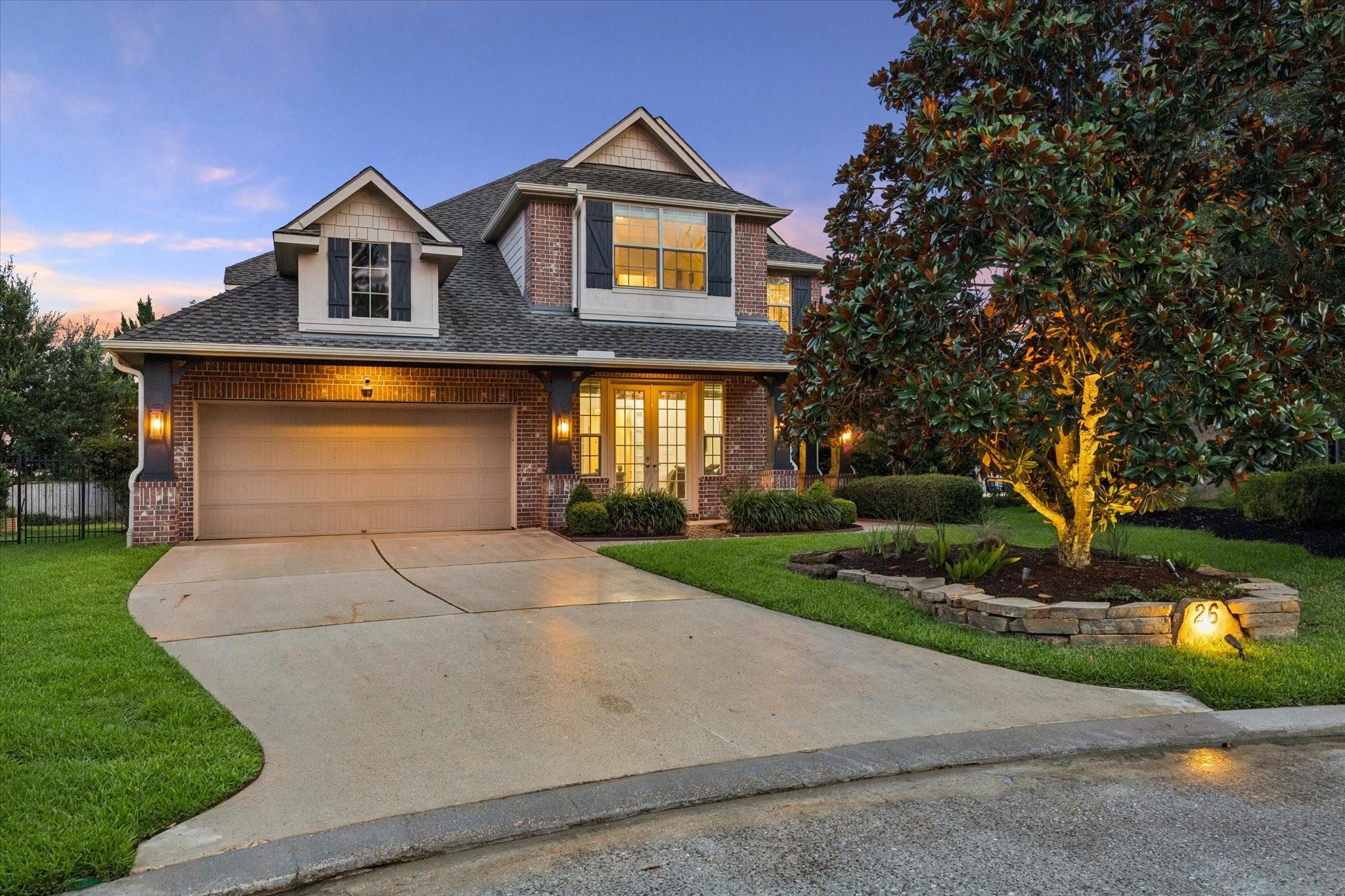 Image 3: Exceptional curb appeal featuring a classic brick