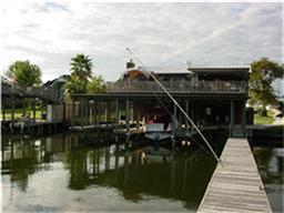 Image 3: View from the pier back at the Lake Conroe Boathou