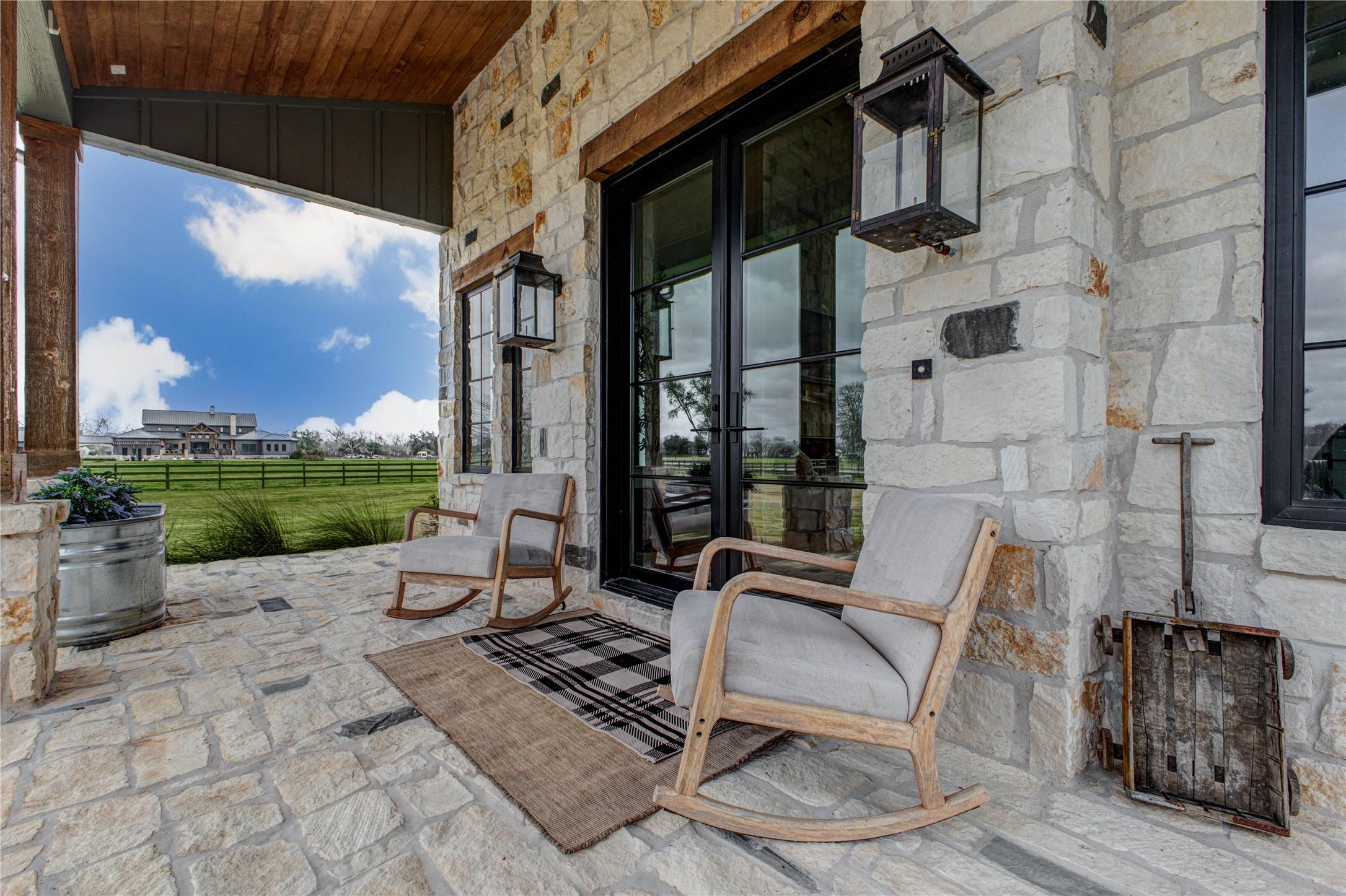 Image 3: This inviting front porch showcases beautiful Hill