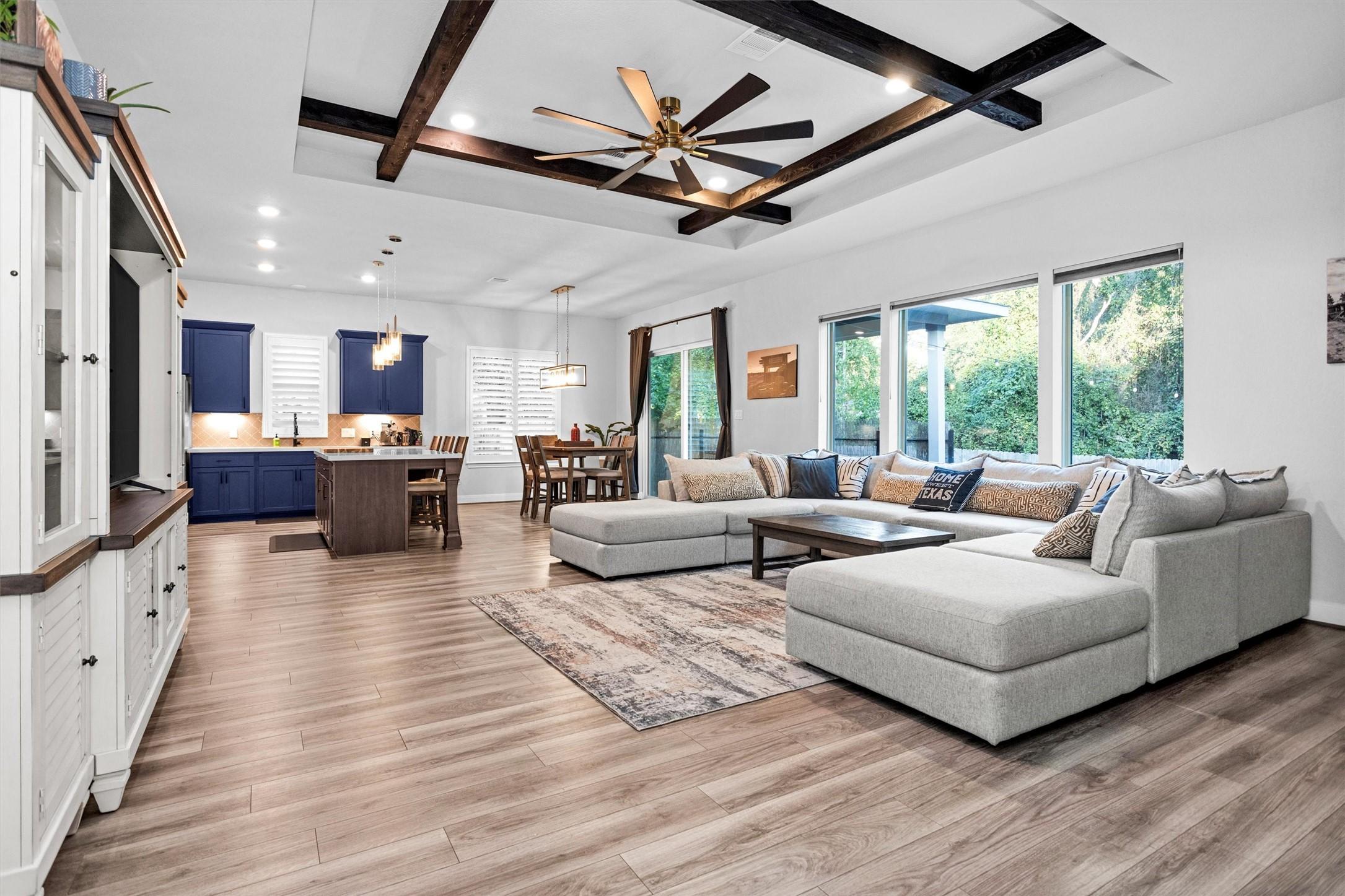 Image 3: Warm and inviting with gorgeous wood beams and new