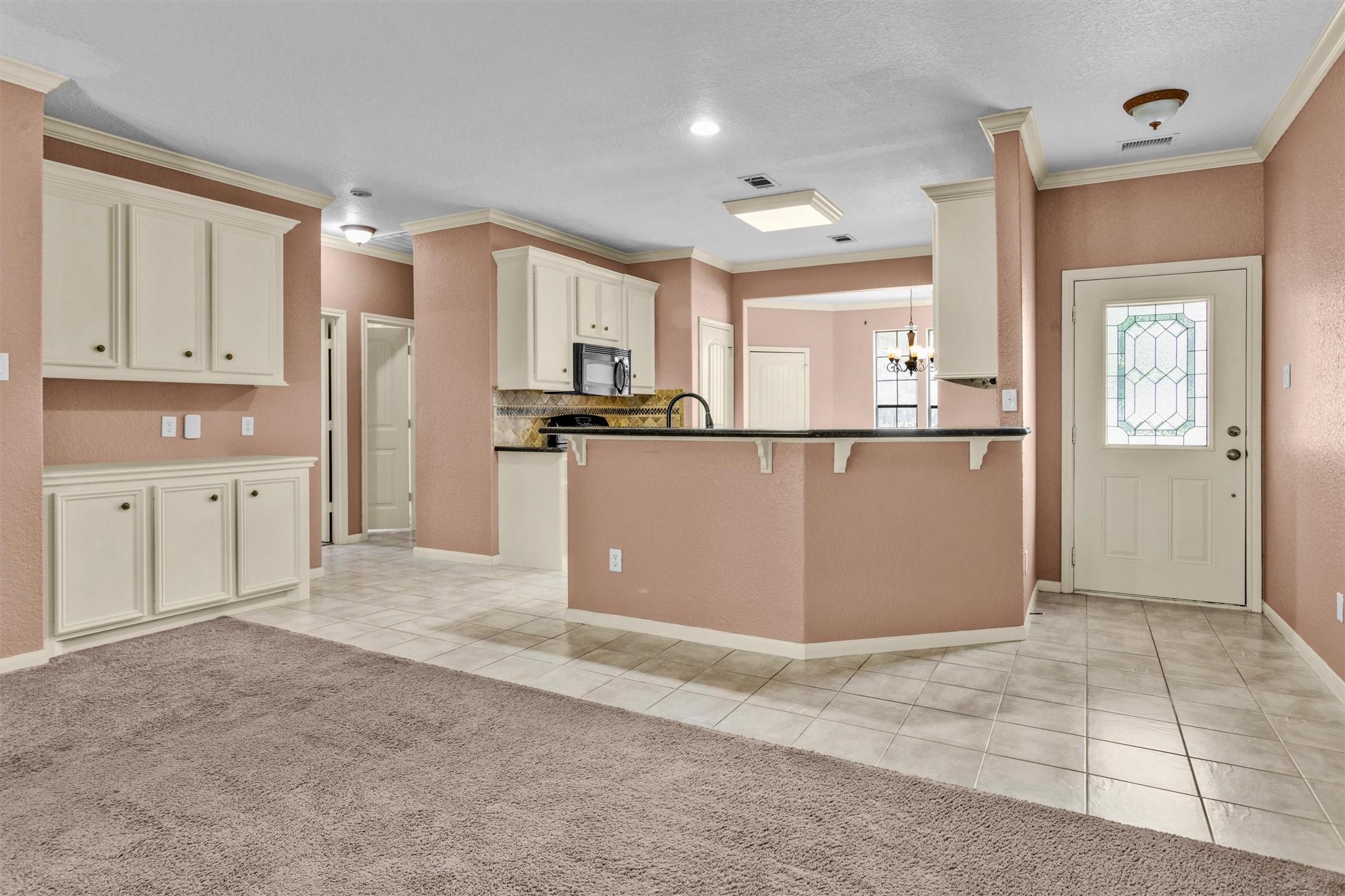 Image 3: Looking back to the front door and kitchen