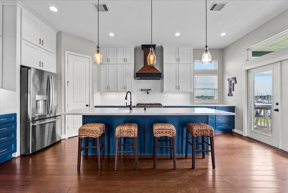 Image 3: Stunning island kitchen is the heart of the home,
